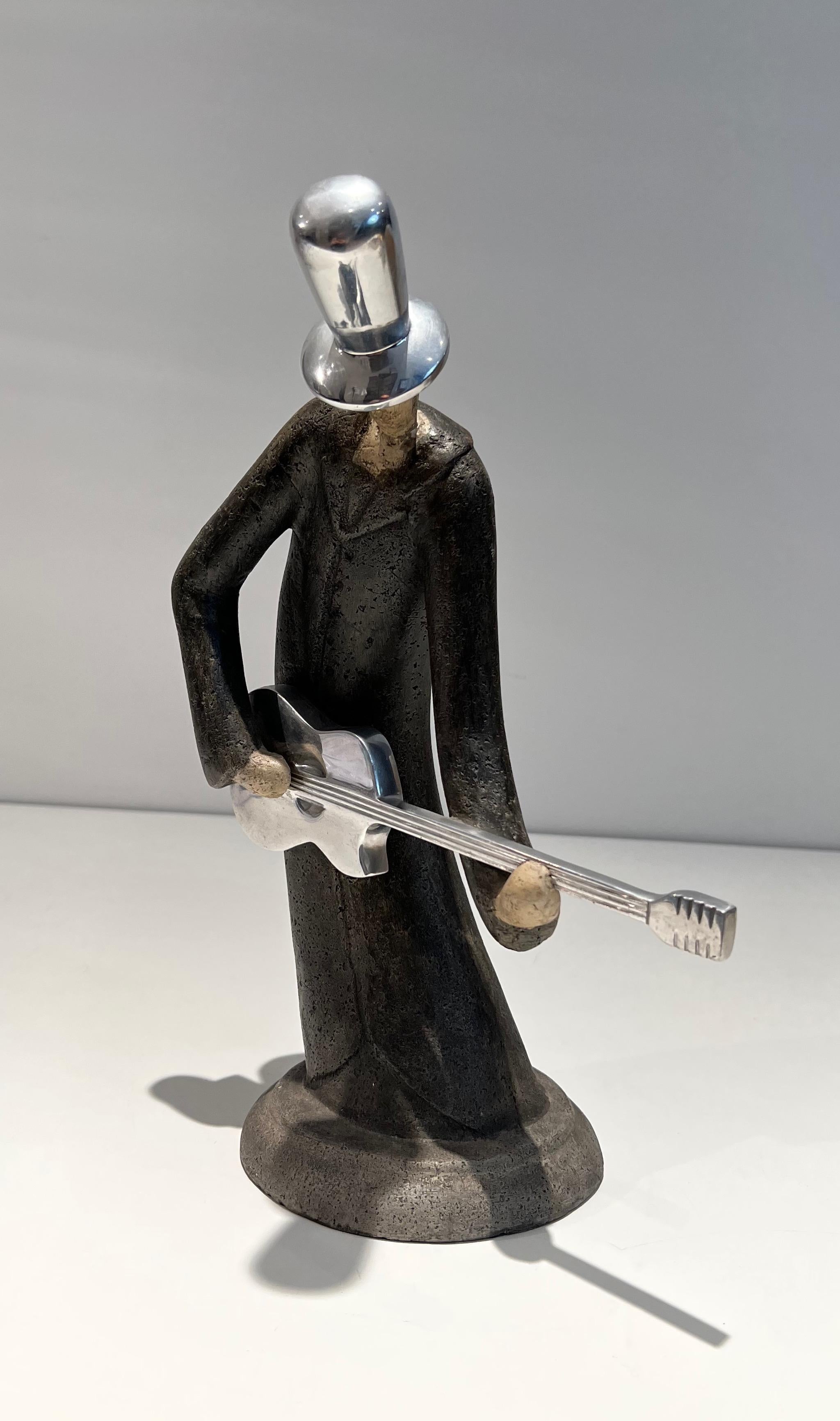 Escultura de un guitarrista en venta 5