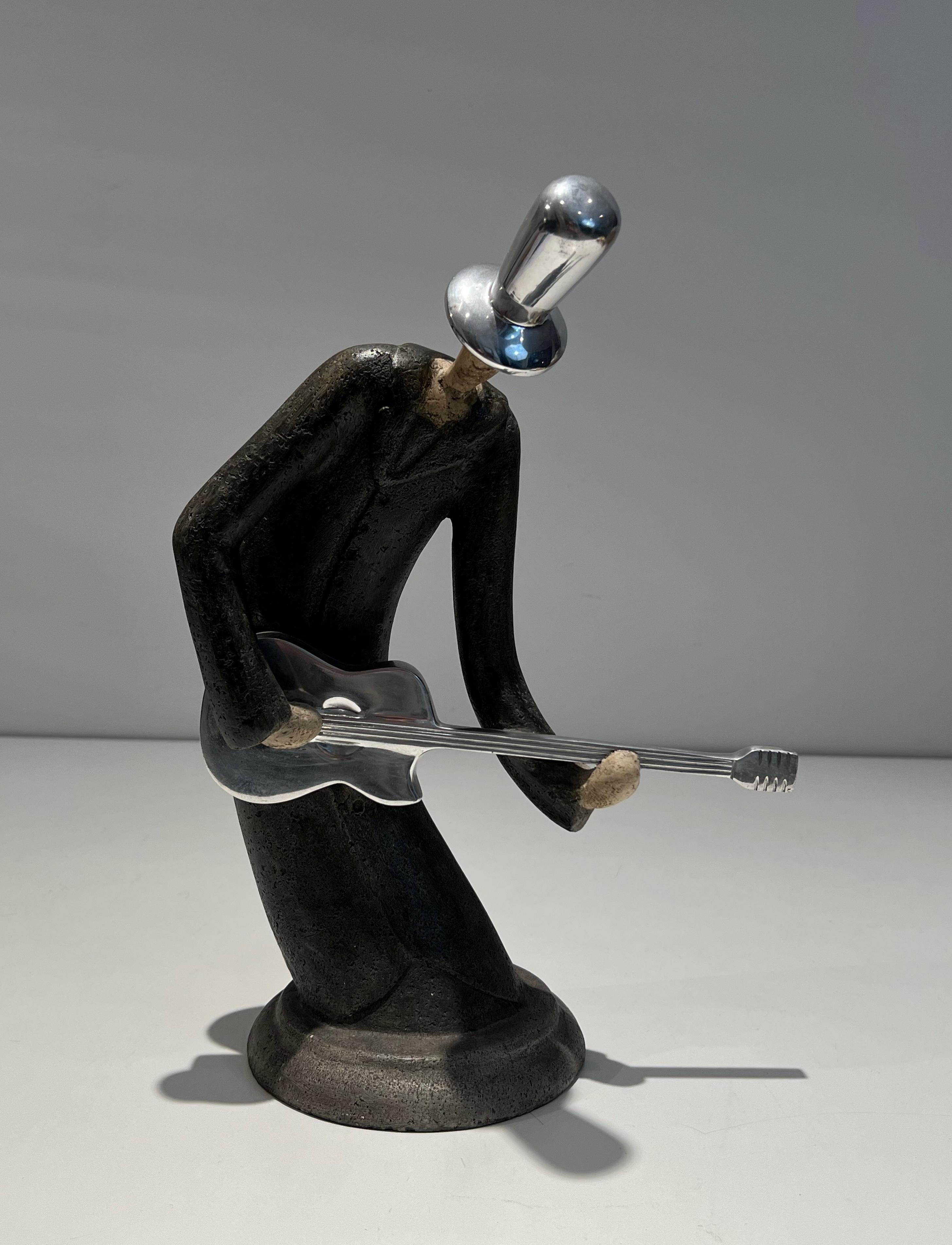 Escultura de un guitarrista en venta 7