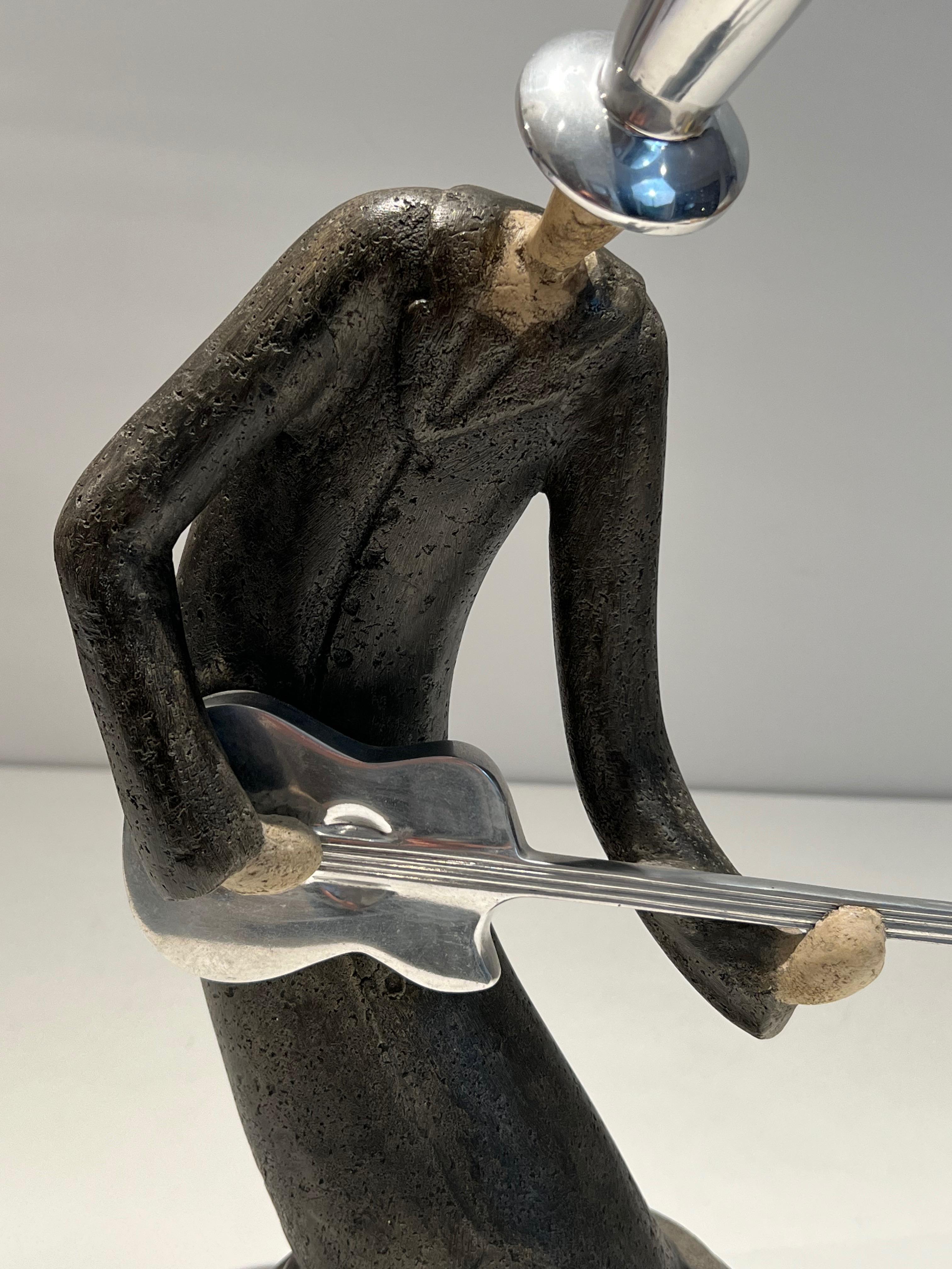 Escultura de un guitarrista en venta 8