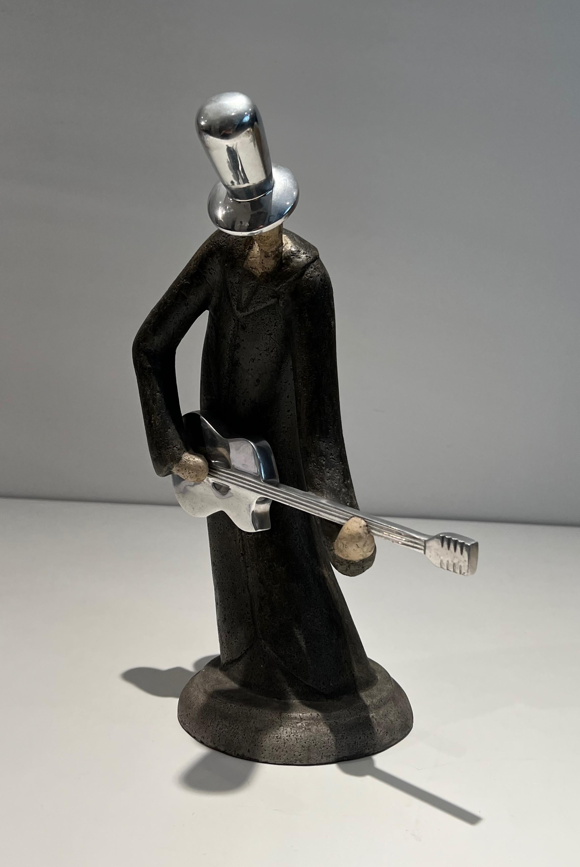 Escultura de un guitarrista en venta 11