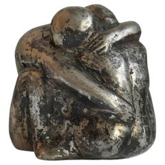 Sculpture of a Hugging Couple in Patinated Silver