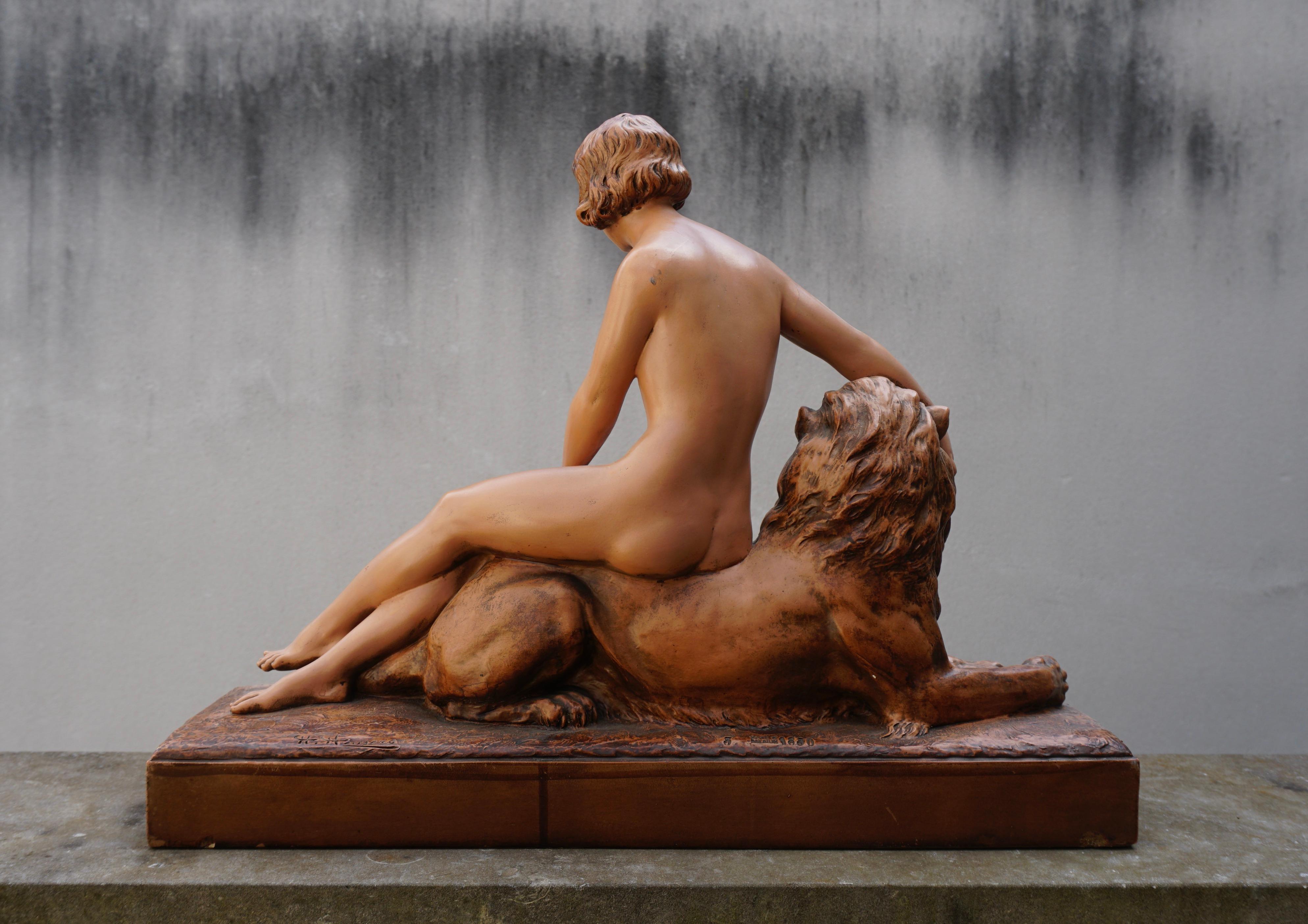 Sculpture of a Nude with Lion. Signed 'H.Heusers'. For Sale 8