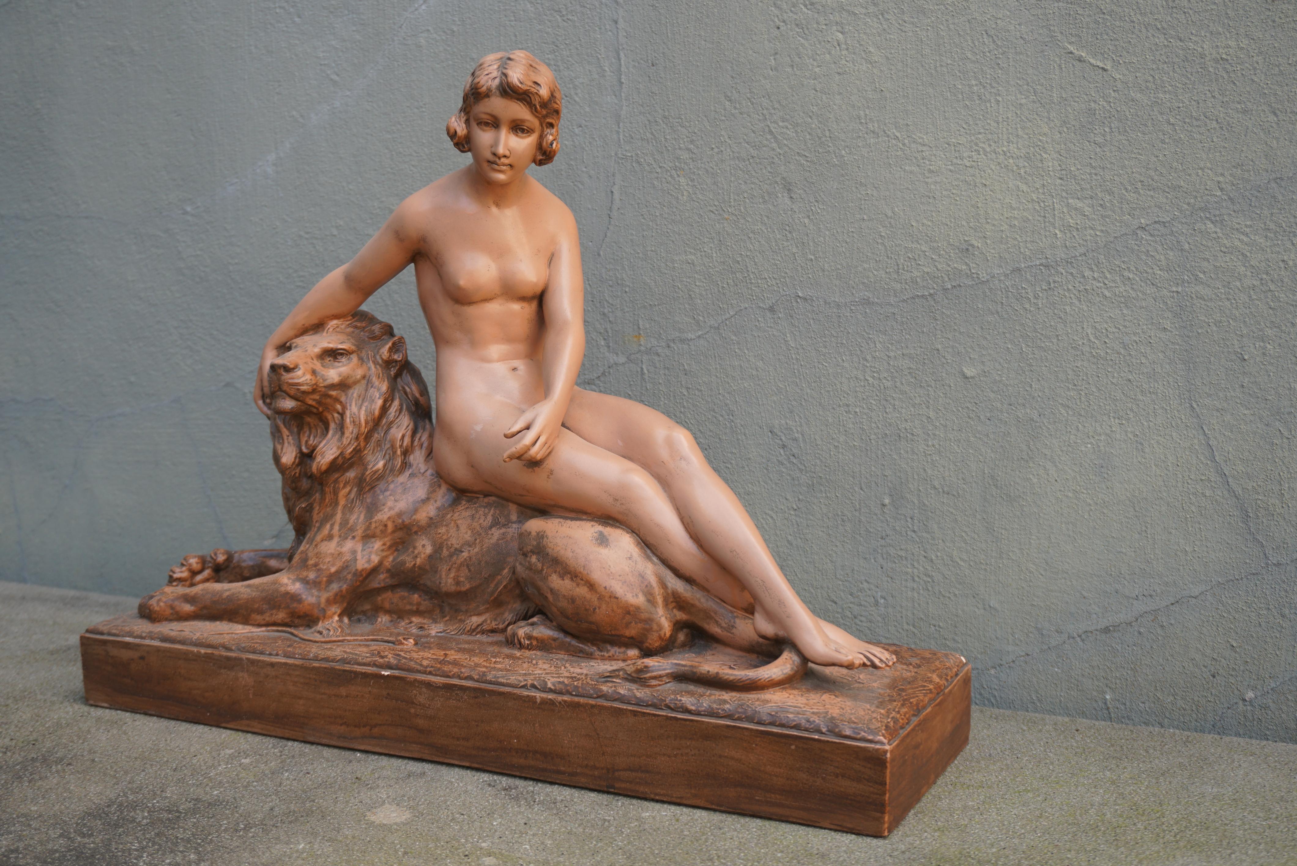 Art Deco Sculpture of a Nude with Lion. Signed 'H.Heusers'. For Sale