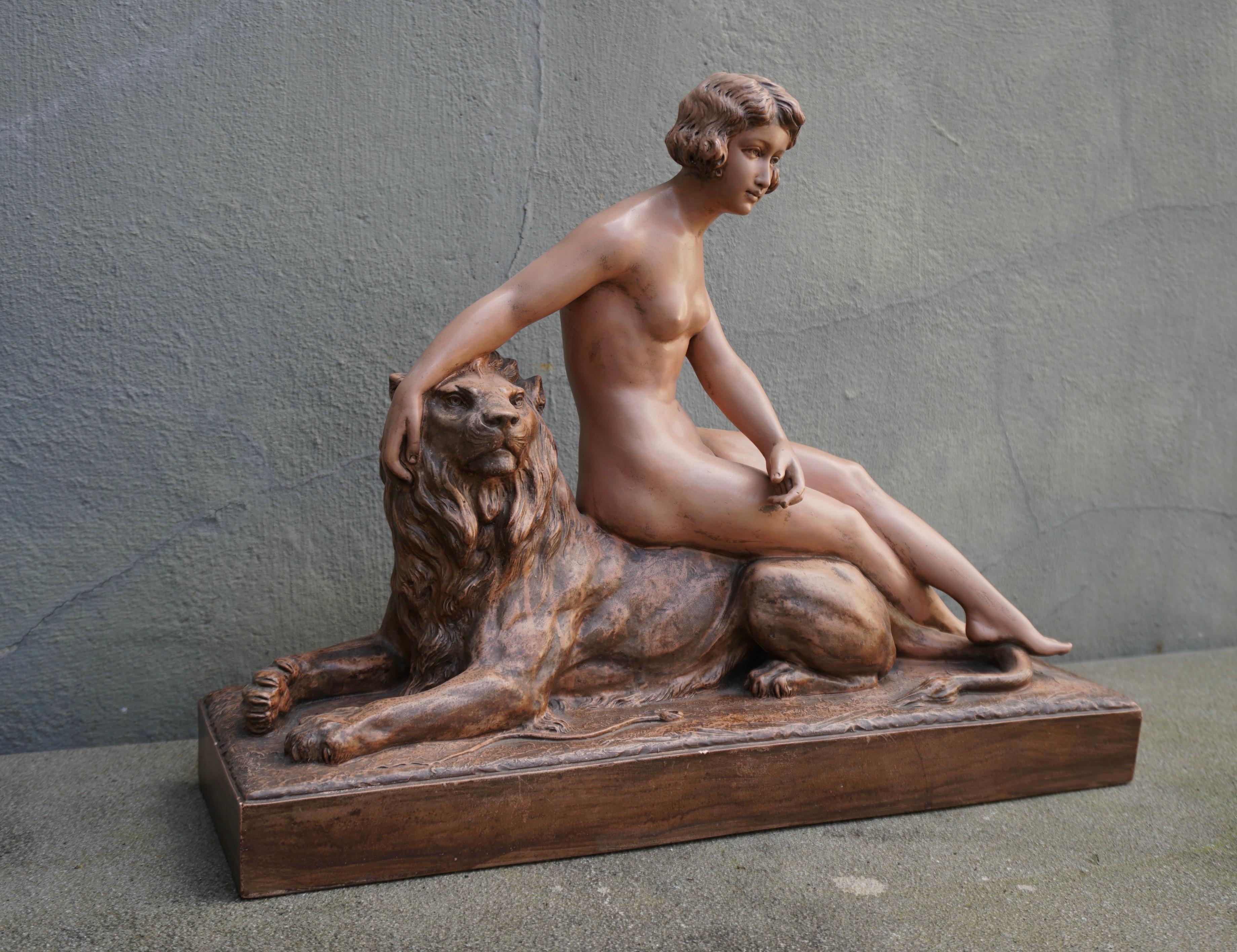 Belgian Sculpture of a Nude with Lion. Signed 'H.Heusers'. For Sale