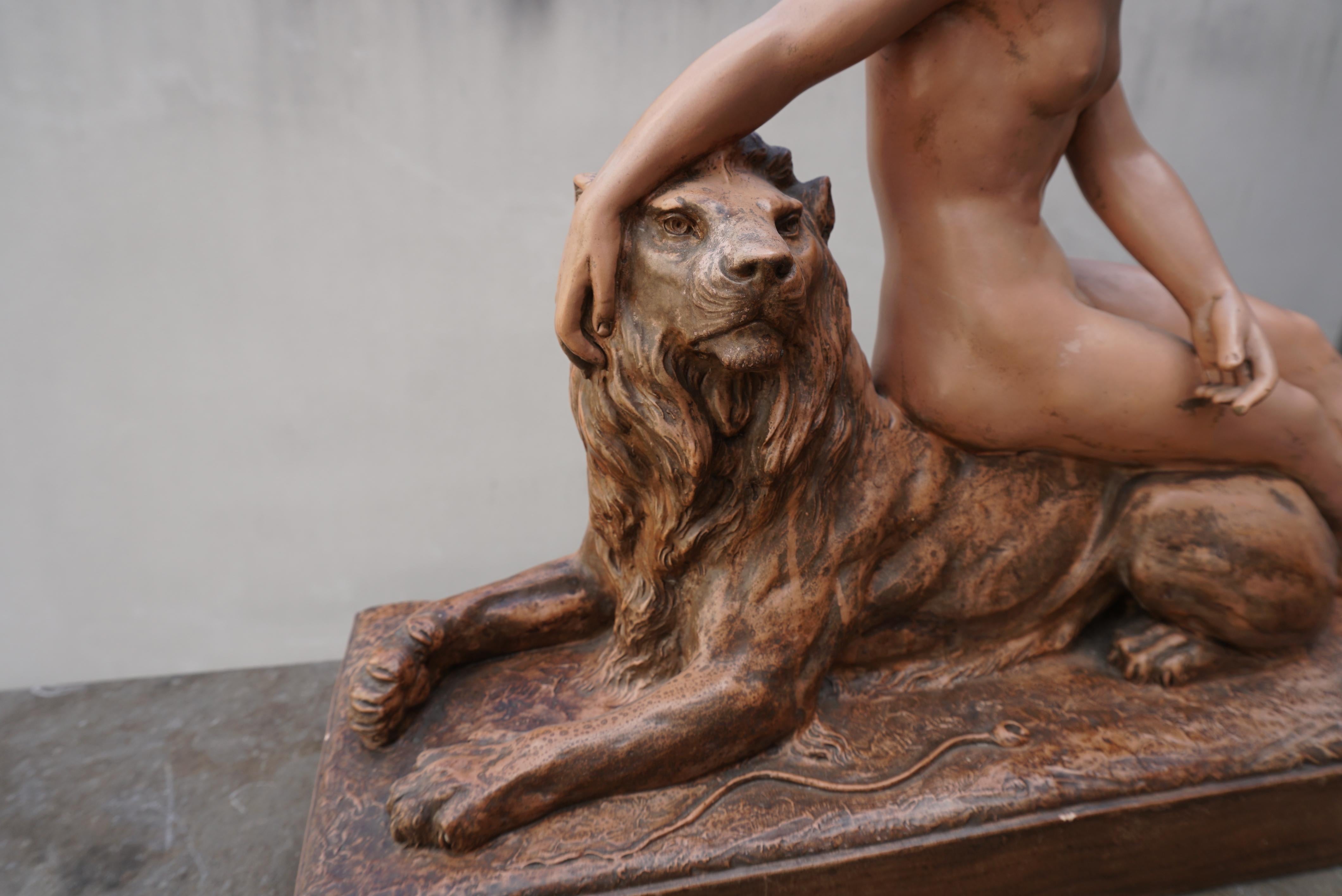 Plaster Sculpture of a Nude with Lion. Signed 'H.Heusers'. For Sale