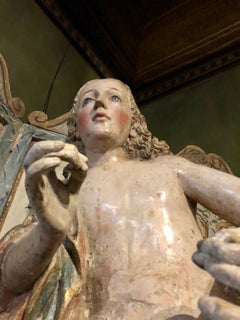 Sculpture of a Polychrome Carved Wooden Angel