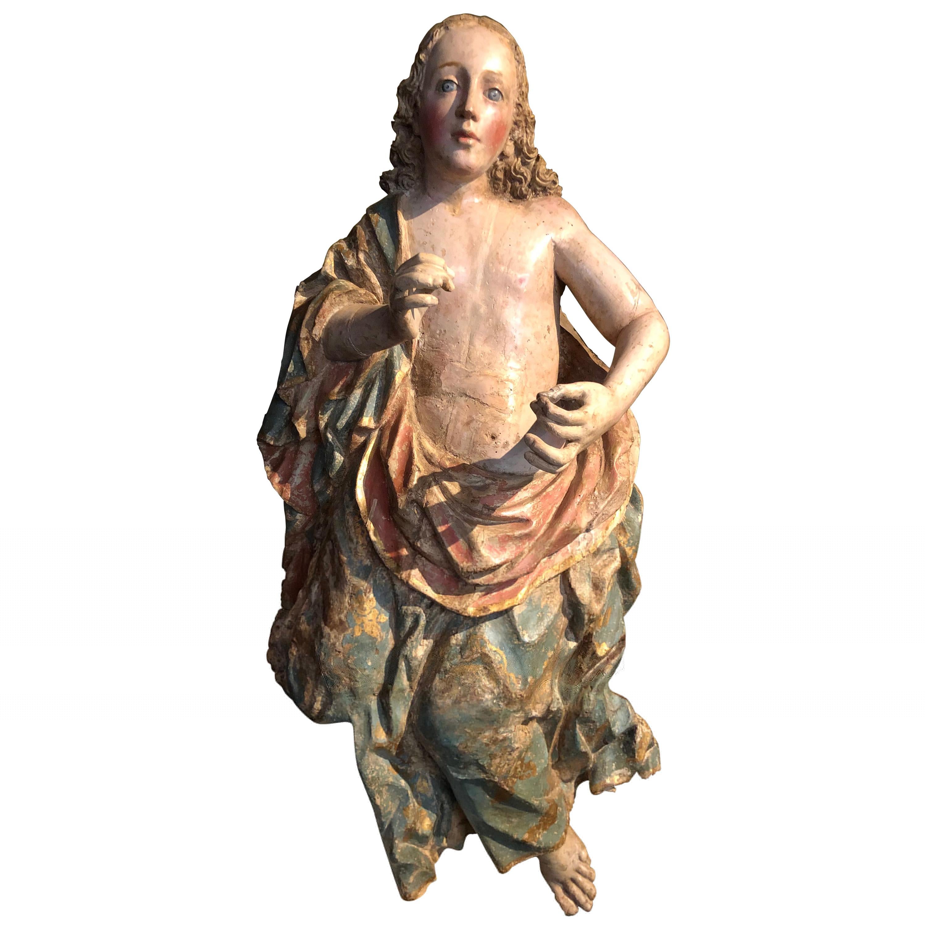 Sculpture of a Polychrome Carved Wooden Angel For Sale