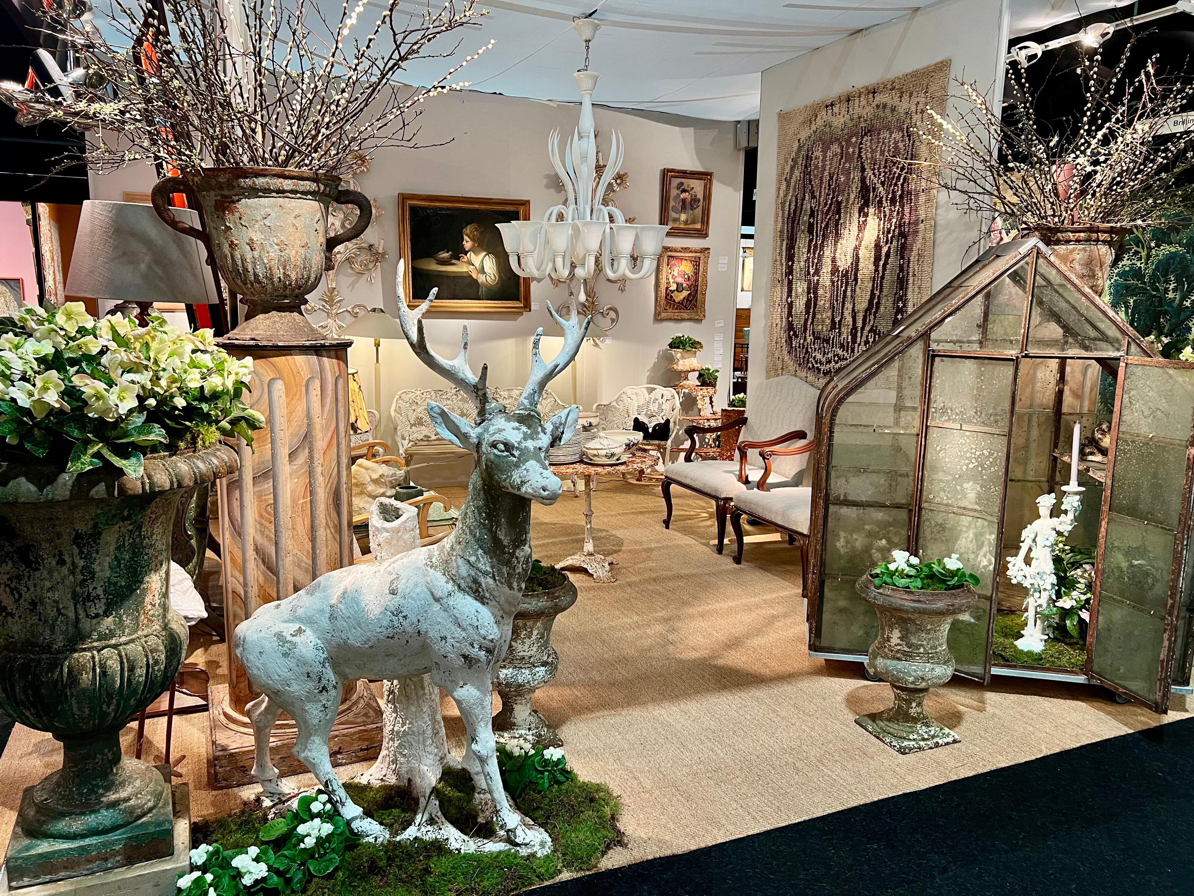 Sculpture of a stag in white painted cement standing against a tree trunk For Sale 2