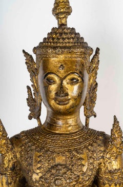 Sculpture of a Standing Buddha in Chased and Gilded Bronze, 18th Century.
