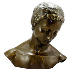 Escultura de rostro inclinado en bronce patinado, Arte contemporáneo, Siglo XXI.