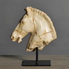 Sculpture of a White Horse's Head.