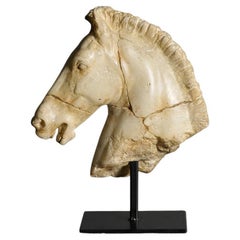 Sculpture of a White Horse's Head.