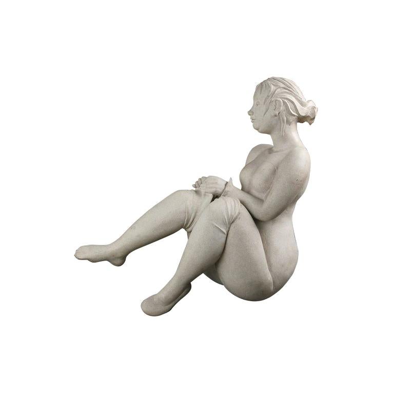 Sculpture of a Woman Dressing