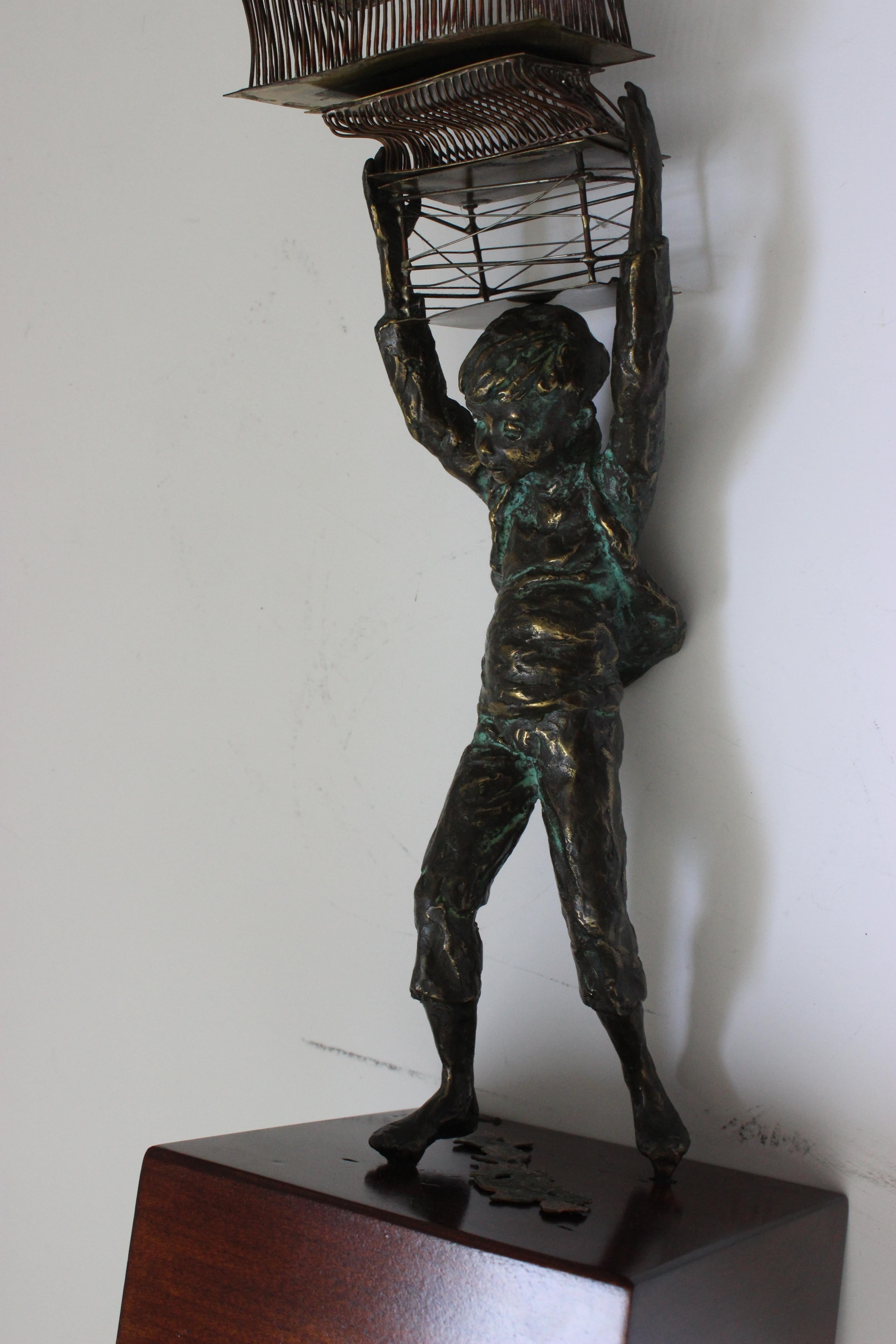 Sculpture of a Young Boy Carrying Birdcages by Curtis Jere For Sale 4