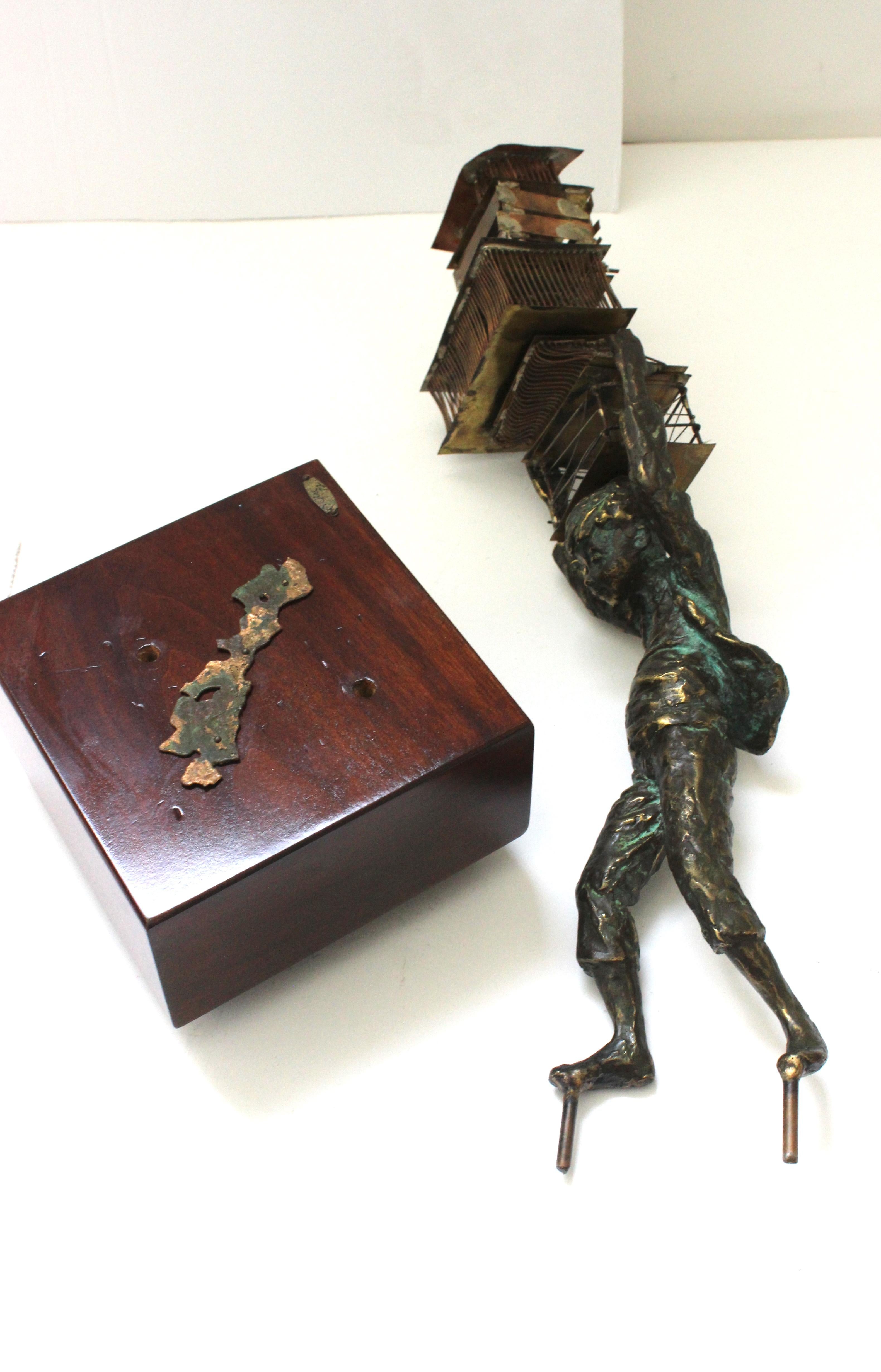 Sculpture of a Young Boy Carrying Birdcages by Curtis Jere For Sale 5