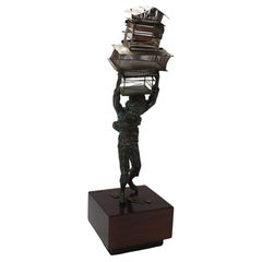 Sculpture of a Young Boy Carrying Birdcages by Curtis Jere