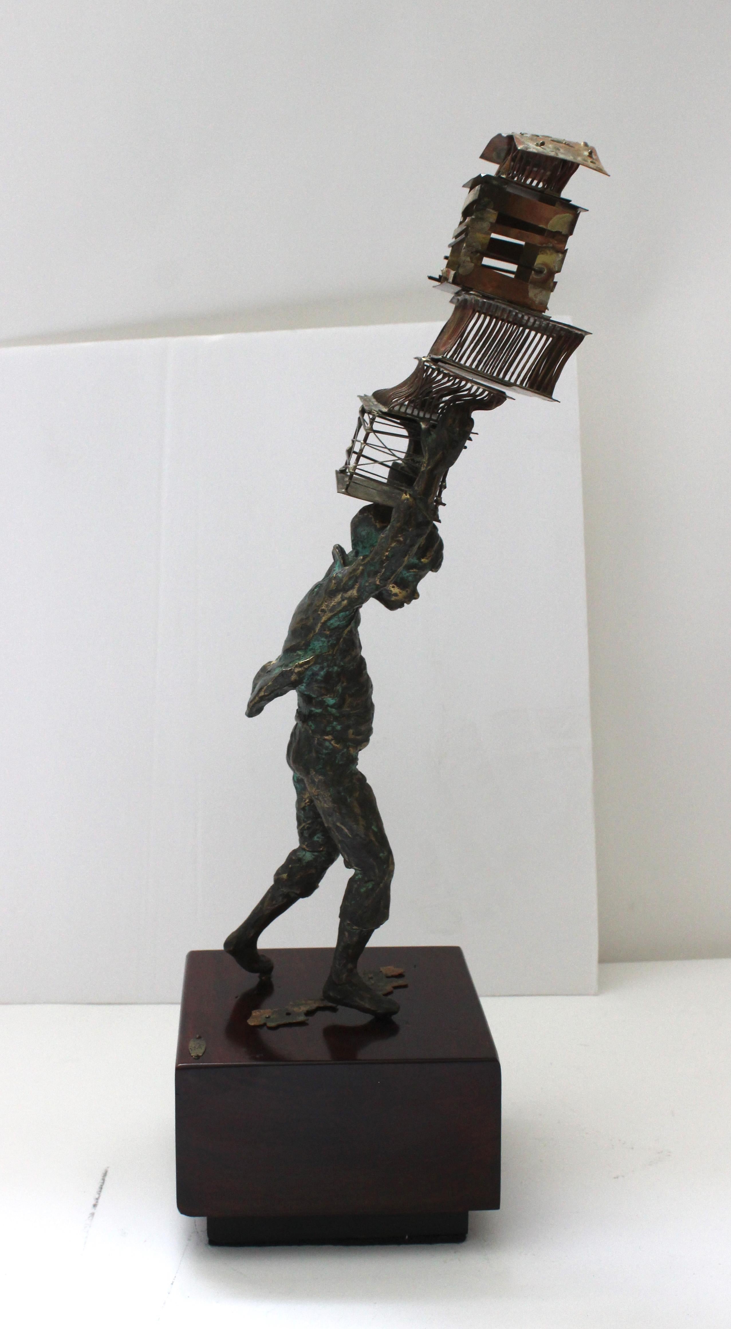 American Sculpture of a Young Boy Carrying Birdcages by Curtis Jere For Sale
