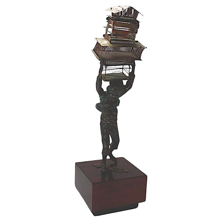 Sculpture of a Young Boy Carrying Birdcages by Curtis Jere For Sale