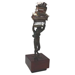 Sculpture of a Young Boy Carrying Birdcages by Curtis Jere