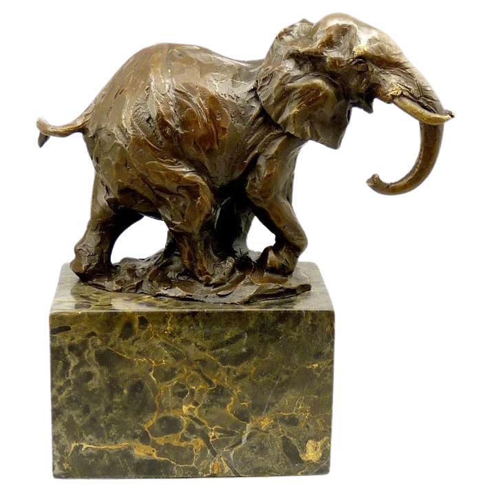 Sculpture of an Elephant in Patinated Bronze, 20th Century.