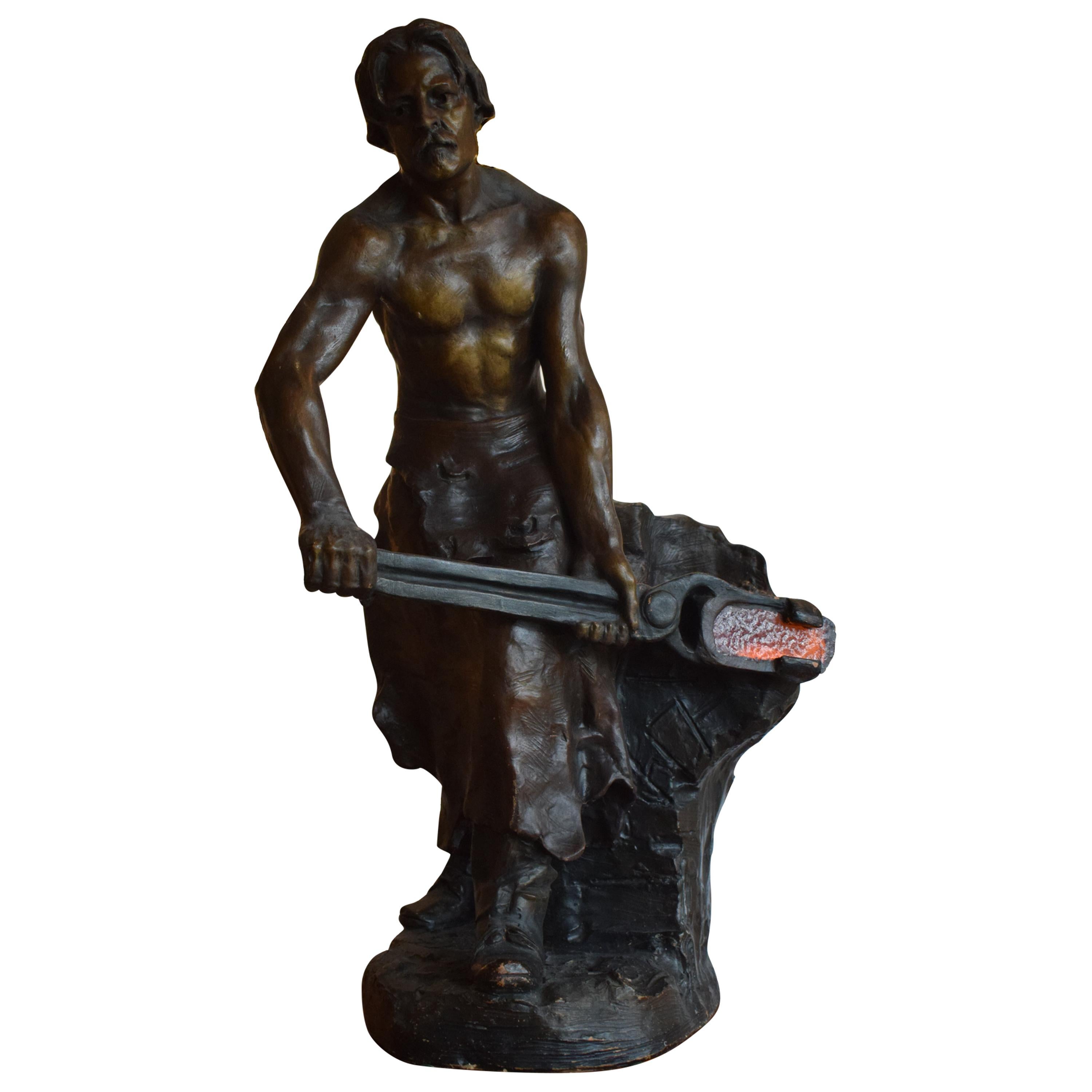Sculpture of Blacksmith For Sale