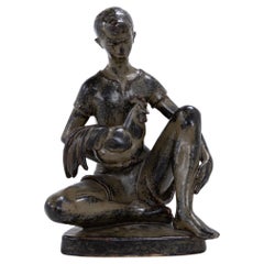 Sculpture of boy and rooster in Sung-glazed stoneware