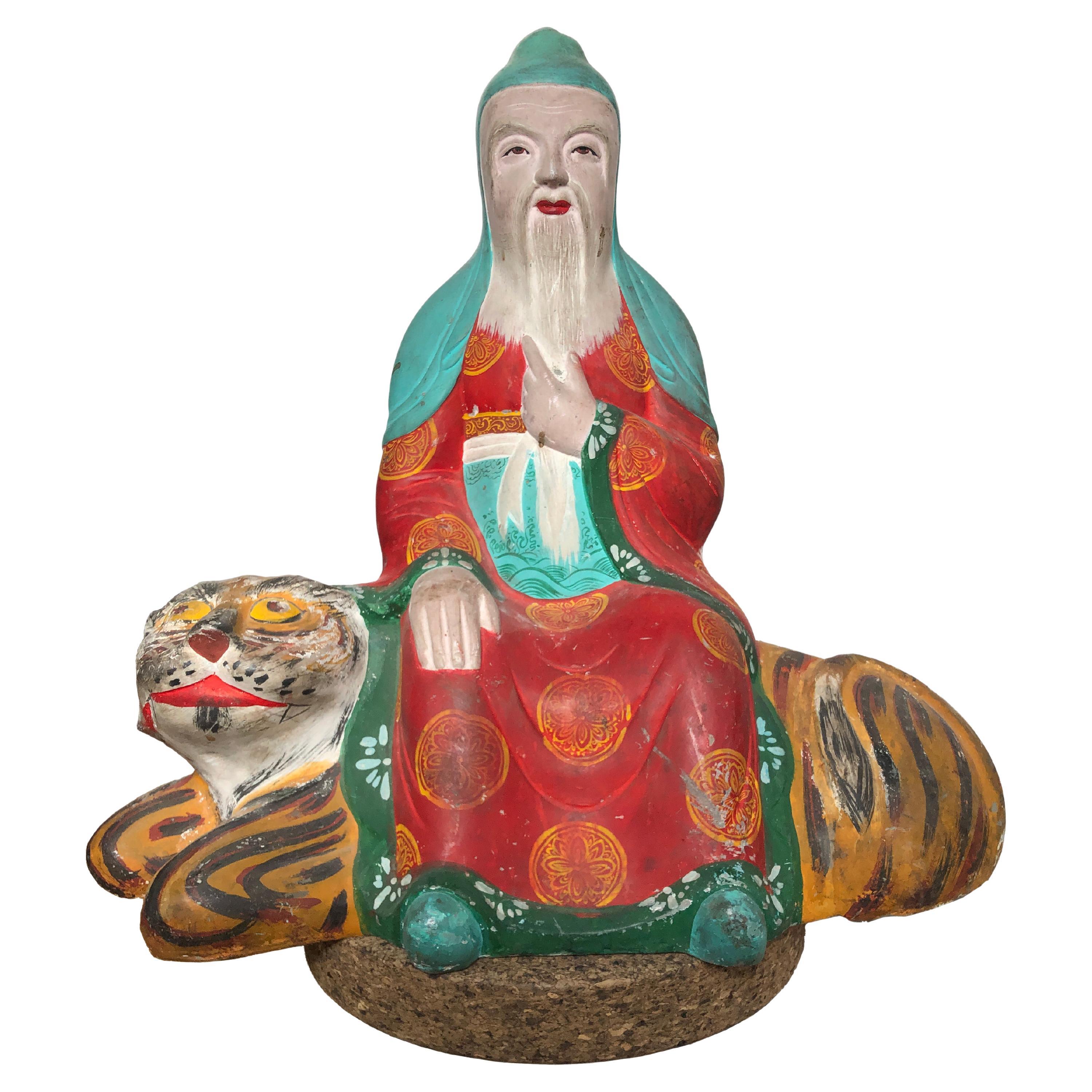 Sculpture of Fearless Monk Riding a Tiger from Lao, People's Democratic Republic For Sale