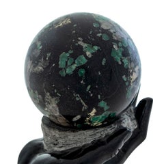 Sculpture of Marble Hand Holding Marble Ball