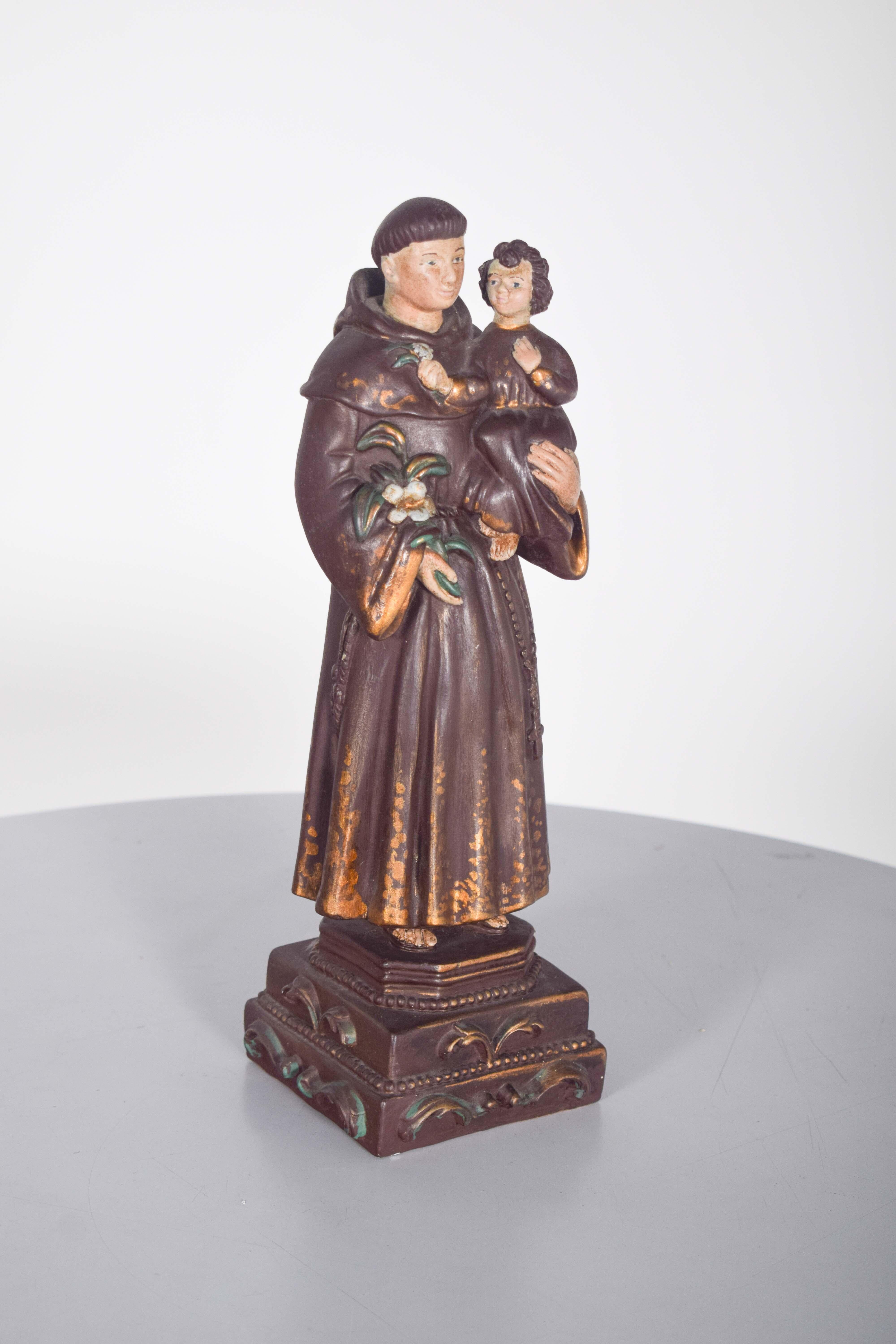 Ceramica Scultura di Sant'Antonio con il Bambino, in ceramica in vendita