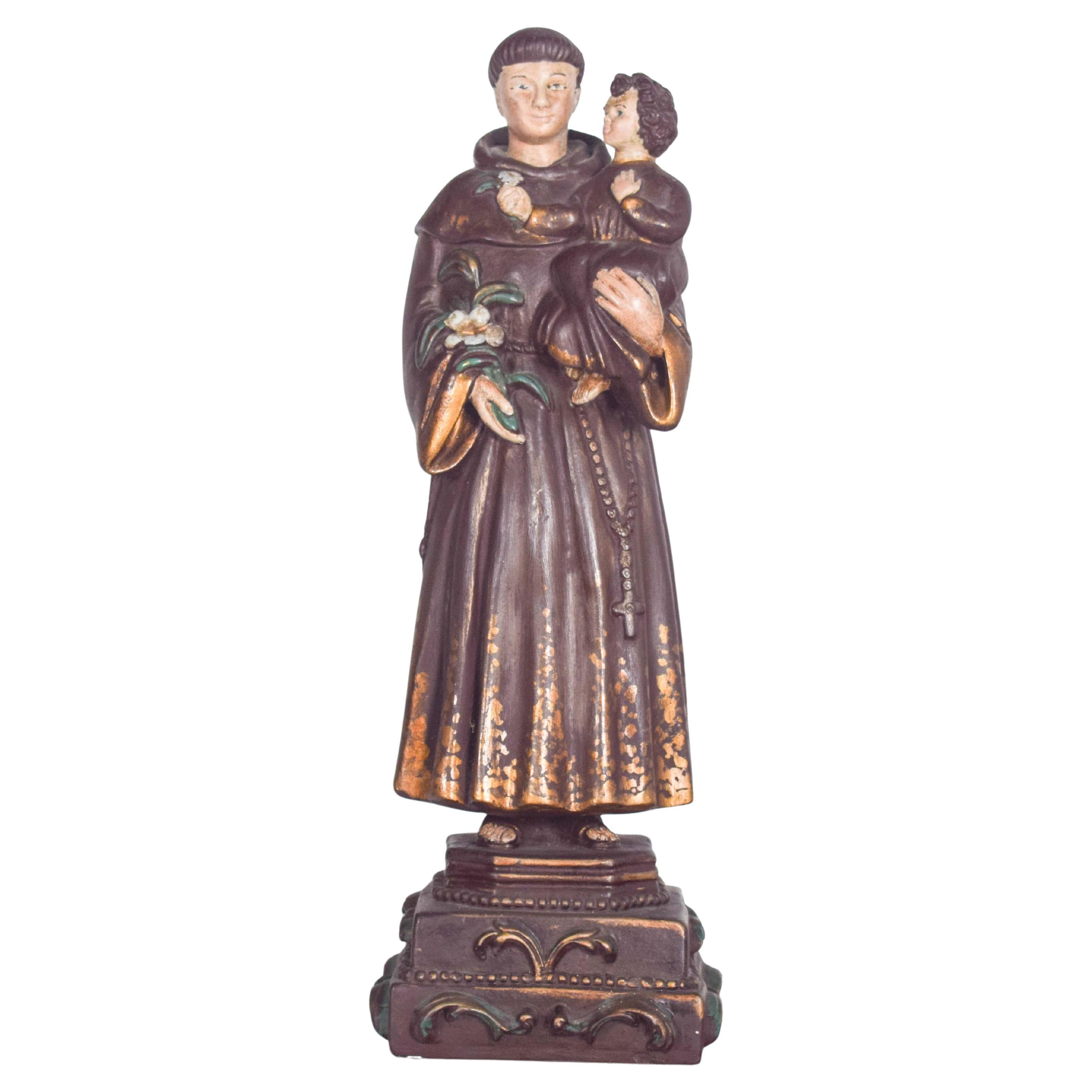 Sculpture de Saint Antoine avec l'enfant, en céramique