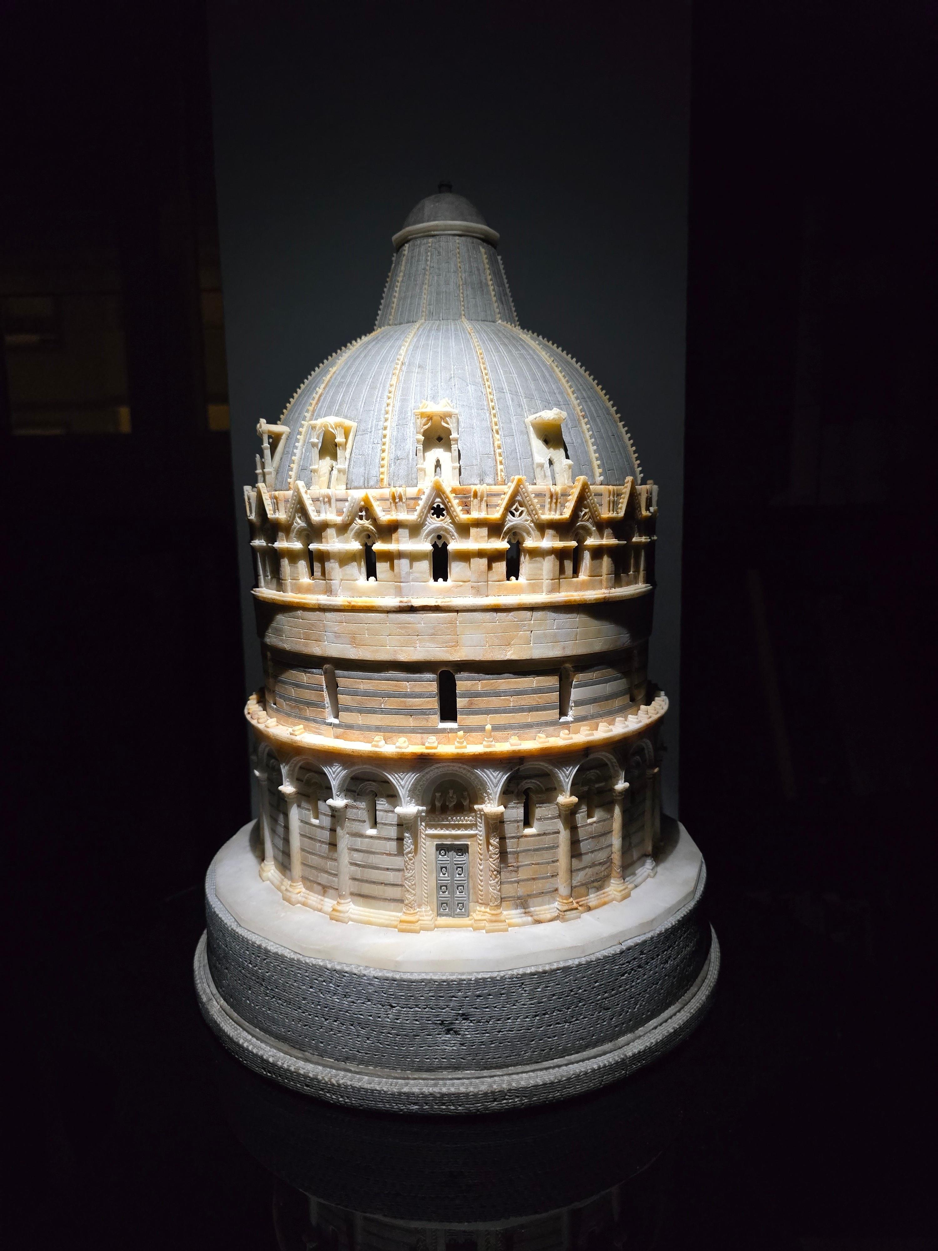 Indulge in the timeless elegance of Giuseppe Andreoni's masterful alabaster sculpture, a faithful replica of the iconic Baptistry in Pisa. Crafted in the mid-19th-century, this exquisite piece intricately captures the grandeur of the original