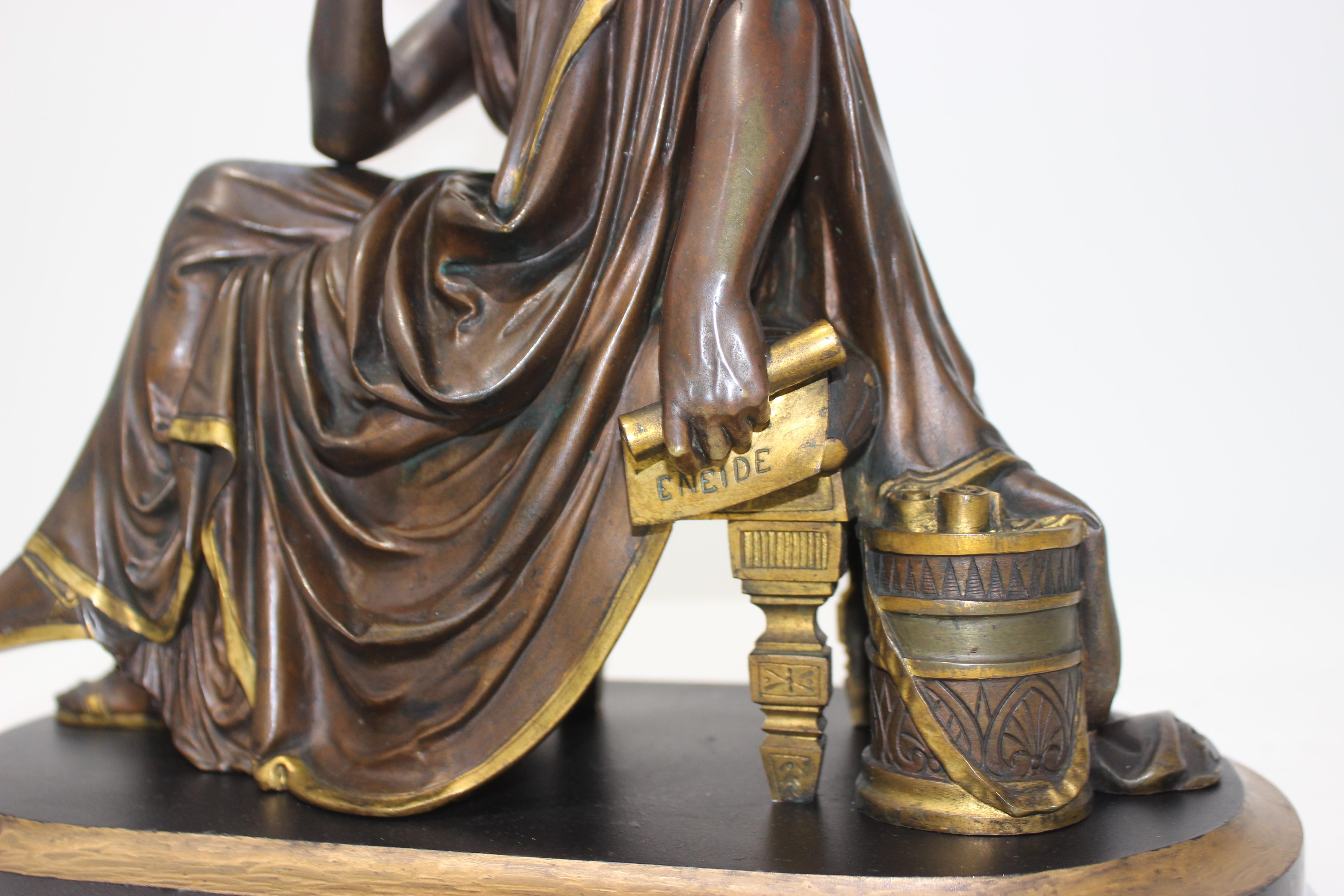 This 19th century Grand Tour bronze depicts the Roman poet Virgil in contemplation and is after the sculptor Albert-Ernest Carrier-Belleuse.

Note: The sculpture is separate from the base.

Note: The base is marble with a painted band in antique