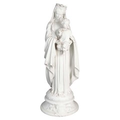 Sculpture Of The Virgin Mary With The Infant Jesus, Made Of Biscuit Porcelain.