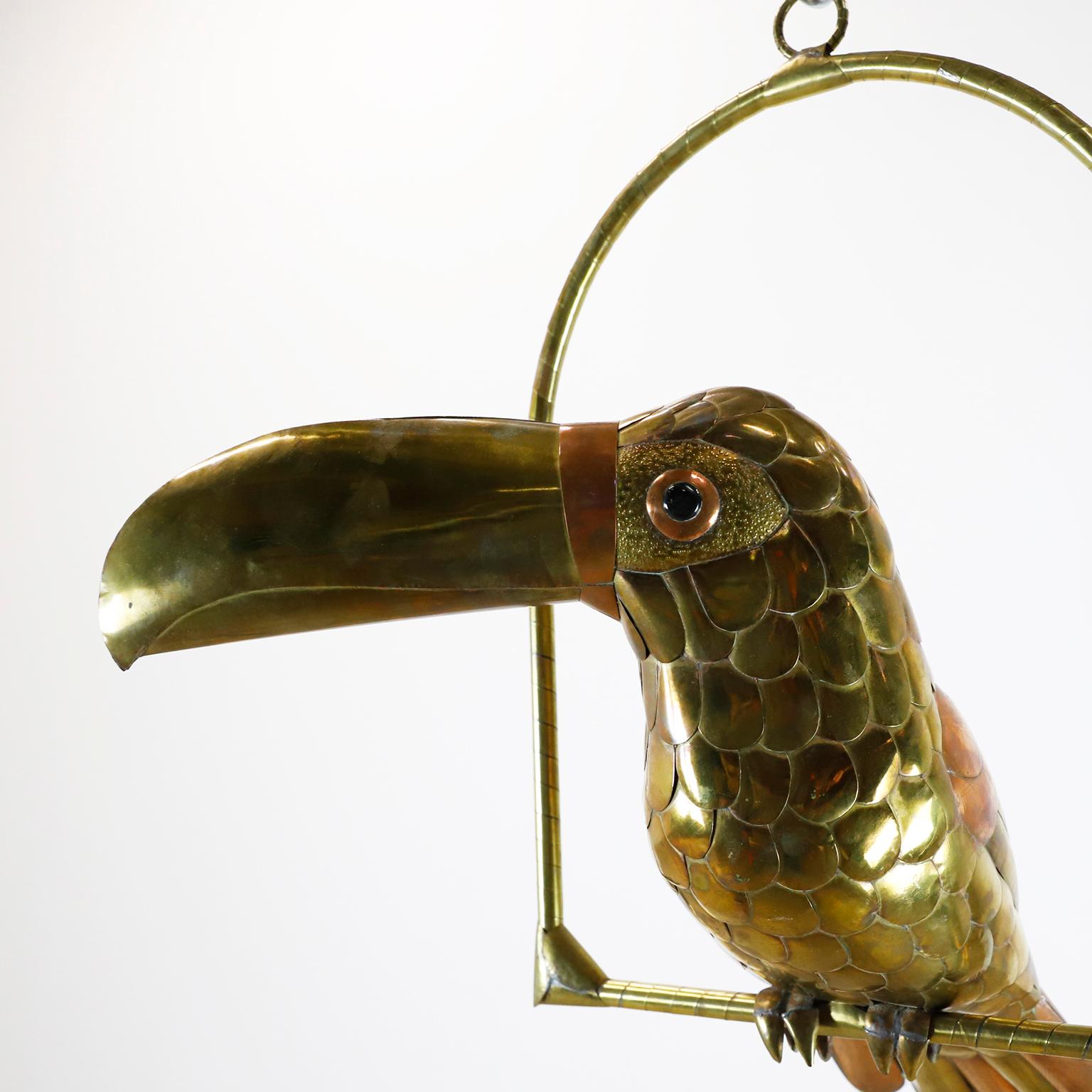 We offer this Toucan sculpture attributed to Mexican artist Sergio Bustamante, circa 1960 made in a beautiful mixed metals cooper and brass.