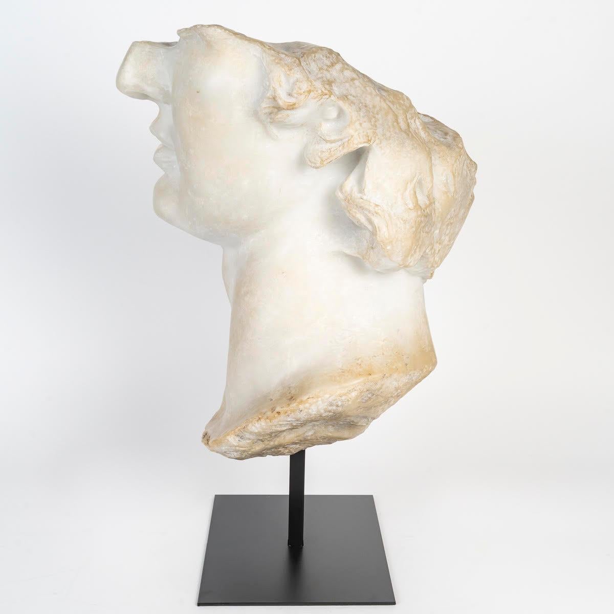 Greco Roman Sculpture Representing a Fragment of the Bust of Apollo. For Sale