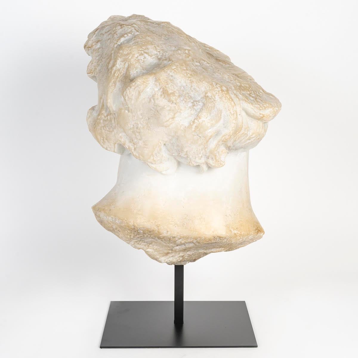 French Sculpture Representing a Fragment of the Bust of Apollo. For Sale