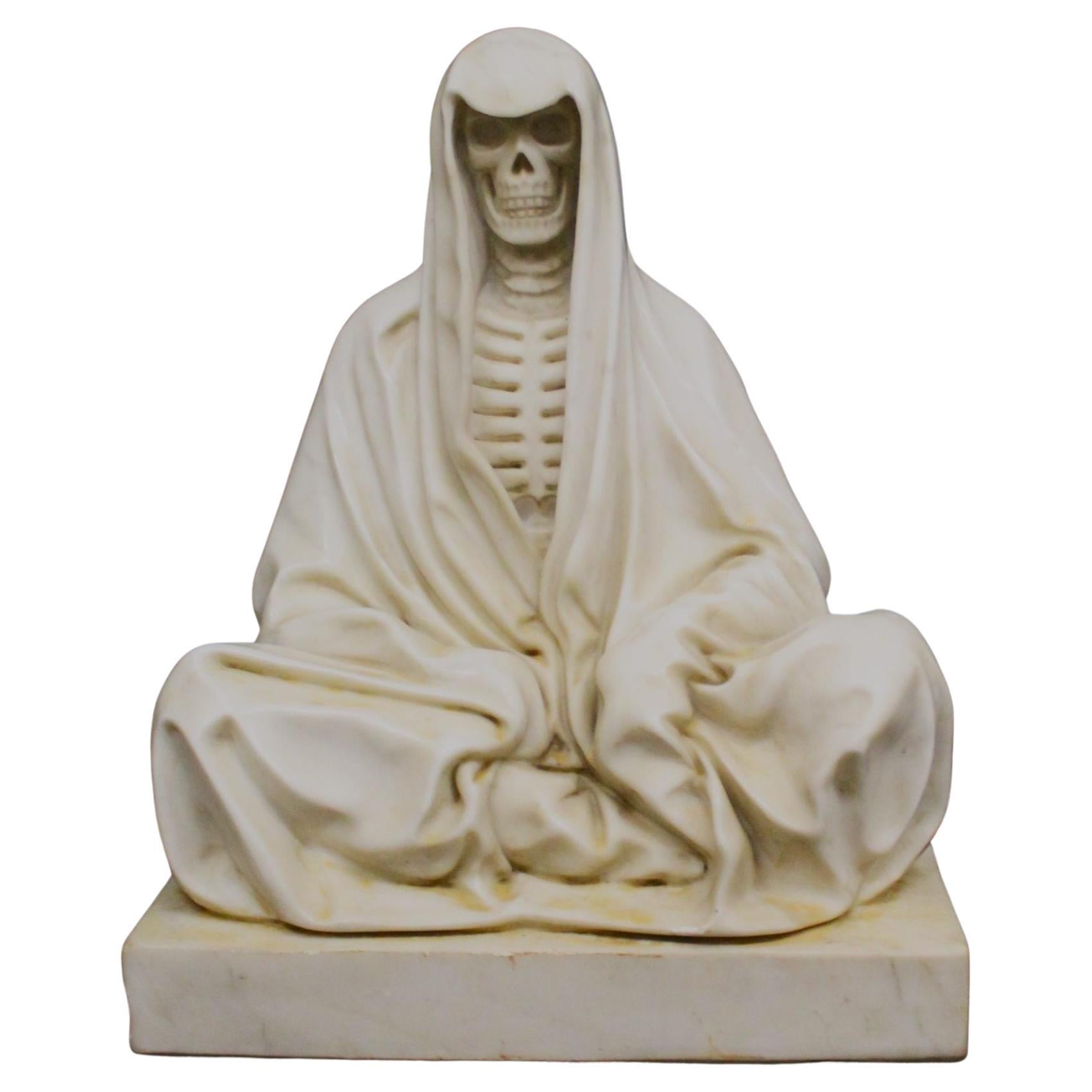 Sculpture representing a skeleton of a beggar in Carrara marble.