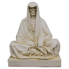 Sculpture representing a skeleton of a beggar in Carrara marble.