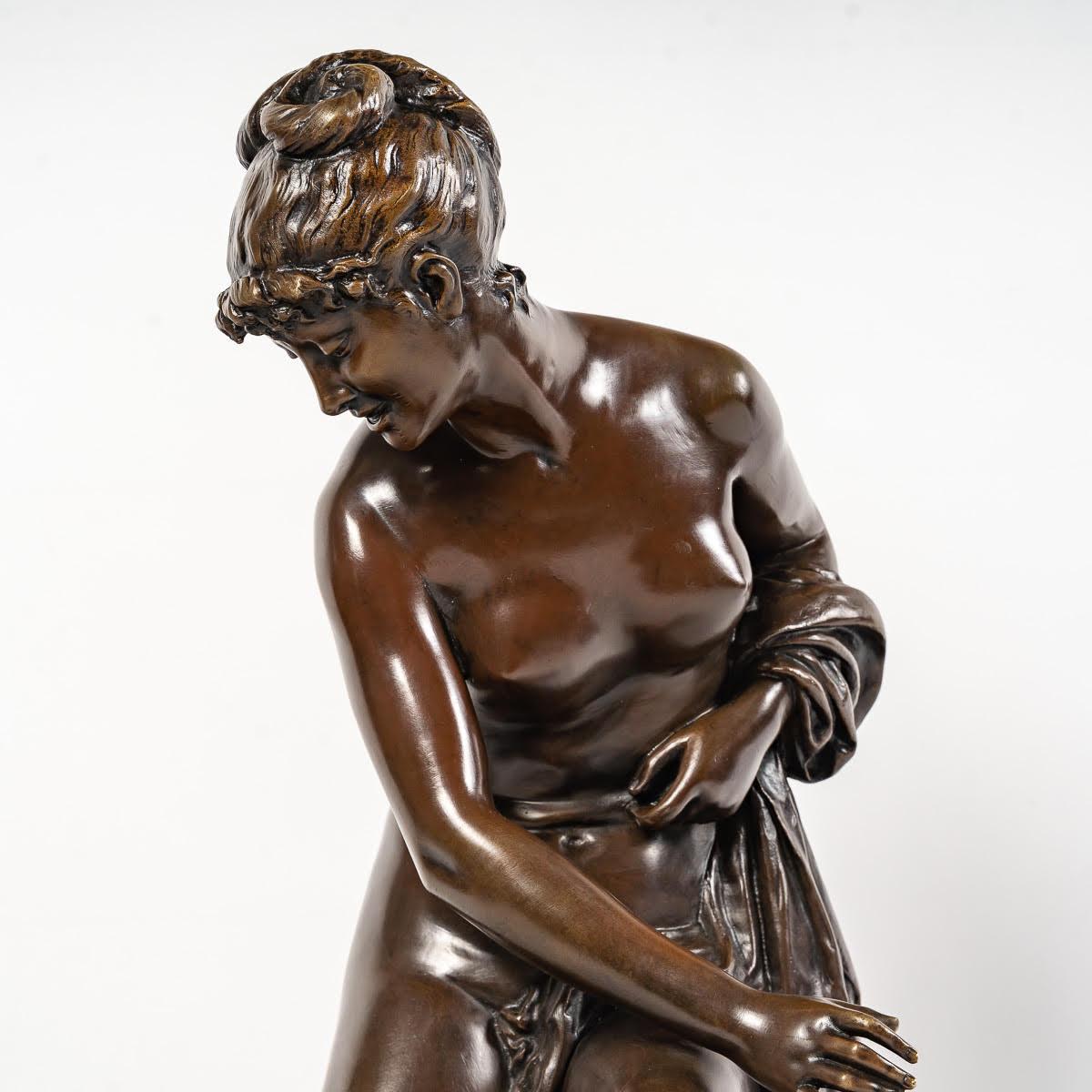 Patinated Sculpture Representing a Woman Sitting on a Rock by Léon Pilet For Sale