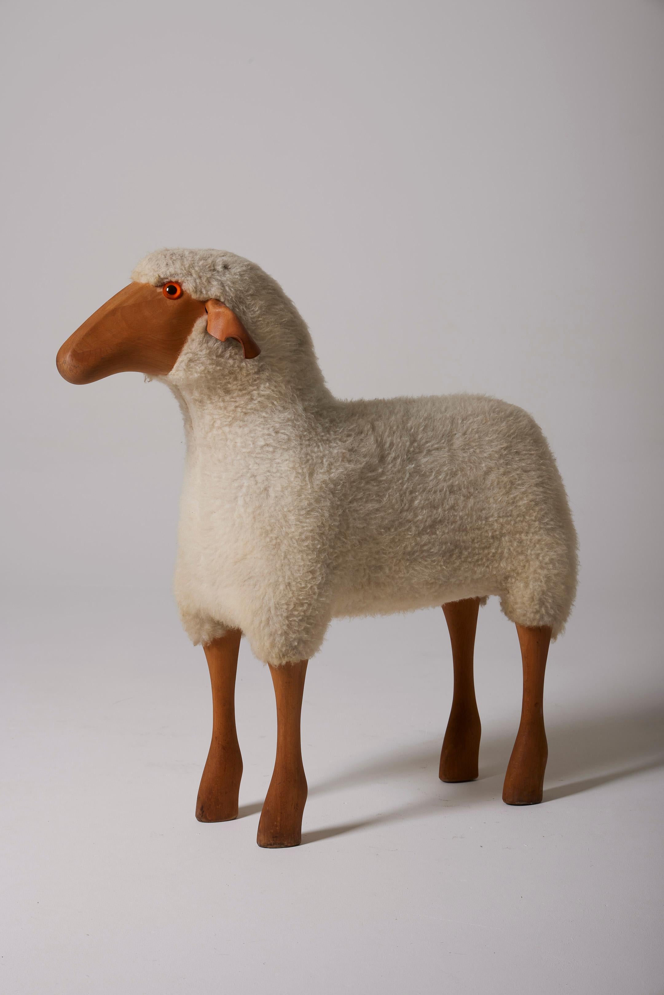 Wooden sheep sculpture by German designer Hanns-Peter Krafft for Meier in the 1980s (1982). This sheep has a wooden structure and a wool covering. Hanns-Peter Krafft is a German artist and designer who collaborates with Meier.Germany, specializing