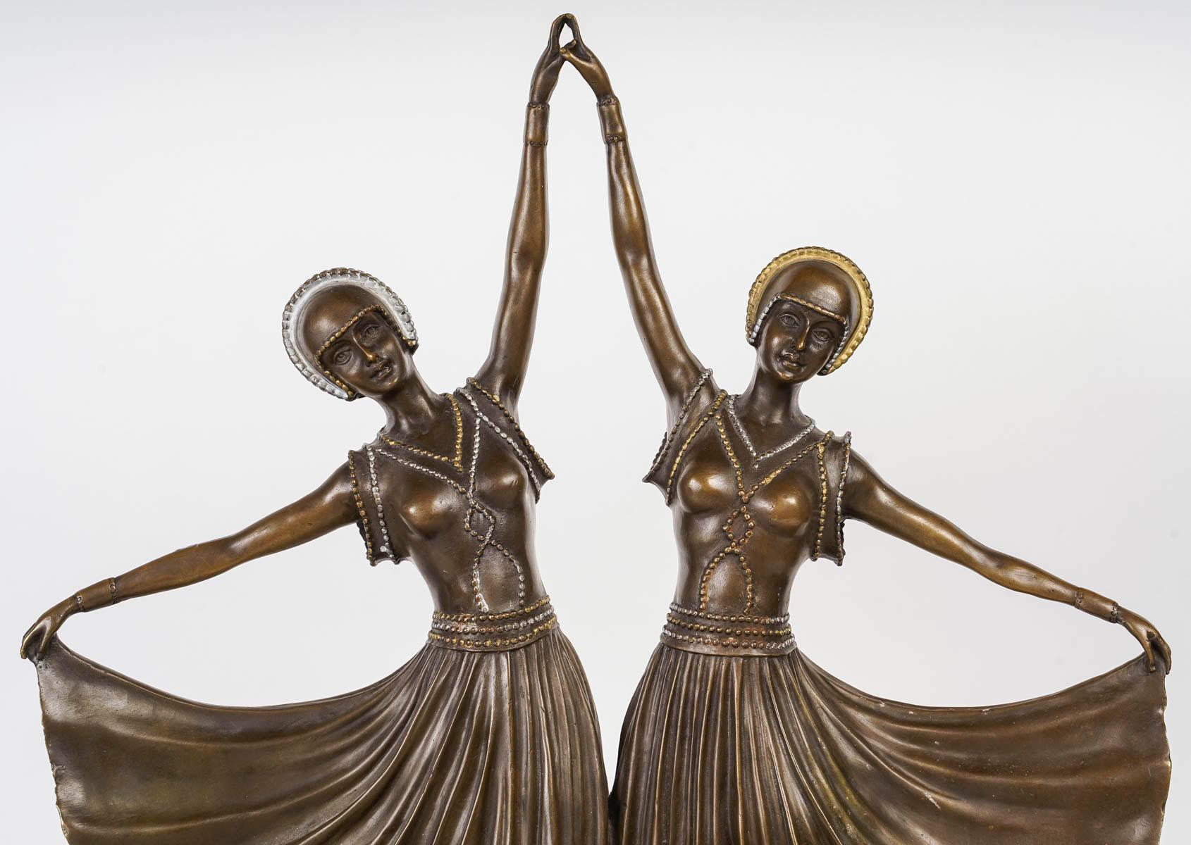 Sculpture, the Dancers in Bronze on a Marble Base in the Art Deco Style, 20th Century.

Sculpture, the Dancers in Bronze on a Marble Plinth in the Art Deco Style, second half of the 20th century.
h: 58.5cm, l: 44cm, 15cm