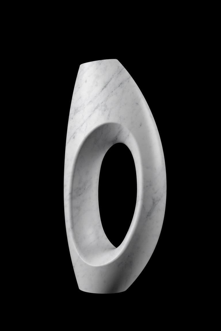 Important sculptural vase carved by hand from a solid block of white Carrara marble. Vase dimension: L 28, W 19, H 61 cm, available in different marbles. Limited edition of 35.

Each vase is hand signed and numbered by the artists (engraved). 100%