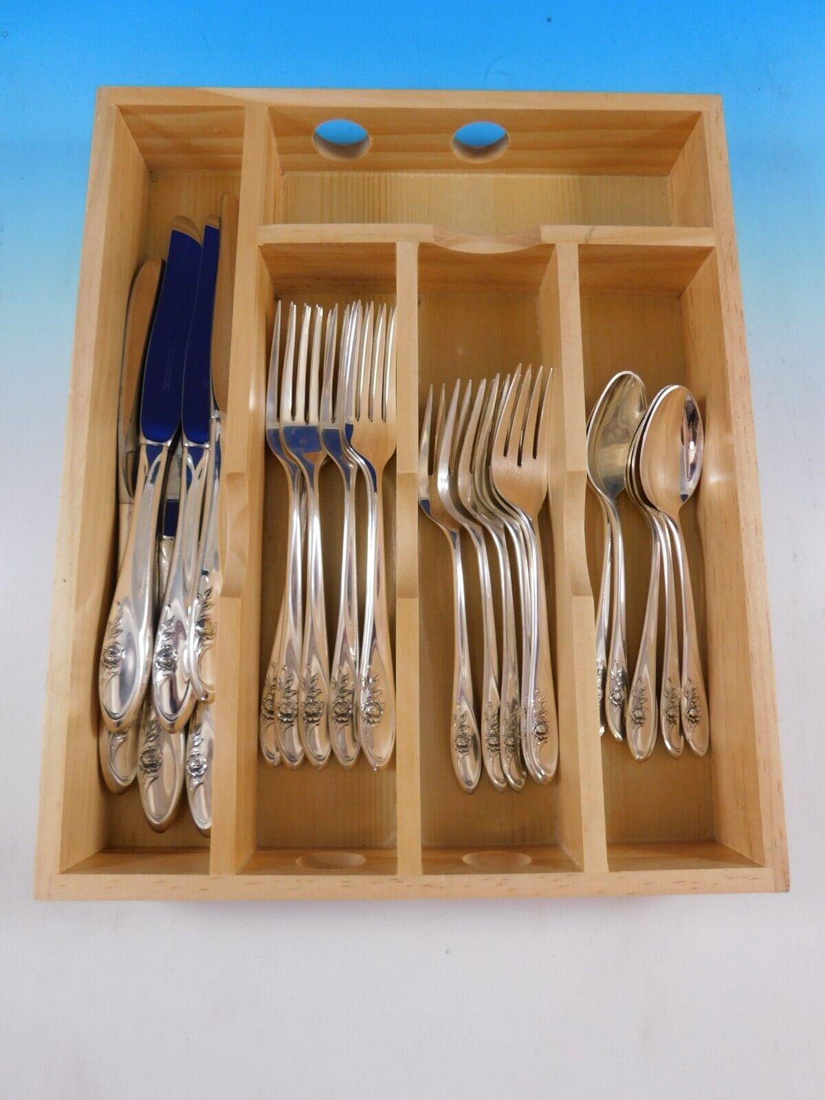 Exquisite Sculptured Rose by Towle Sterling Silver Flatware set - 24 pieces. This set includes:

6 Knives, 9 1/8