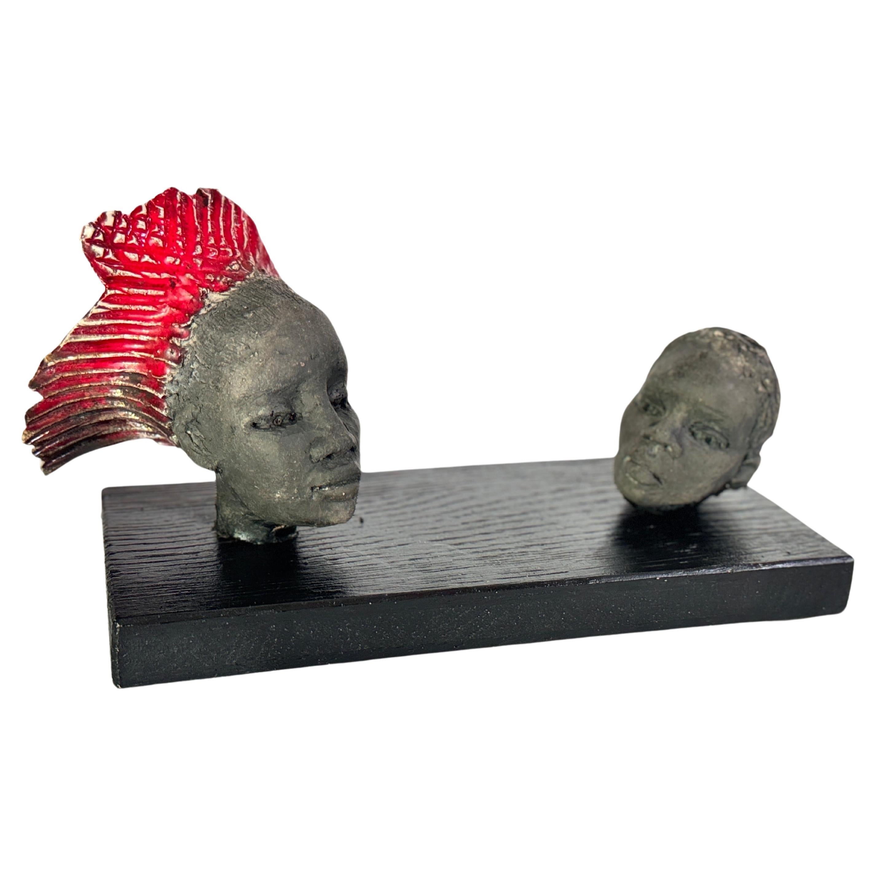 Sculptures in Wood and Ceramic from France in a Black-Red Color 20TH Century