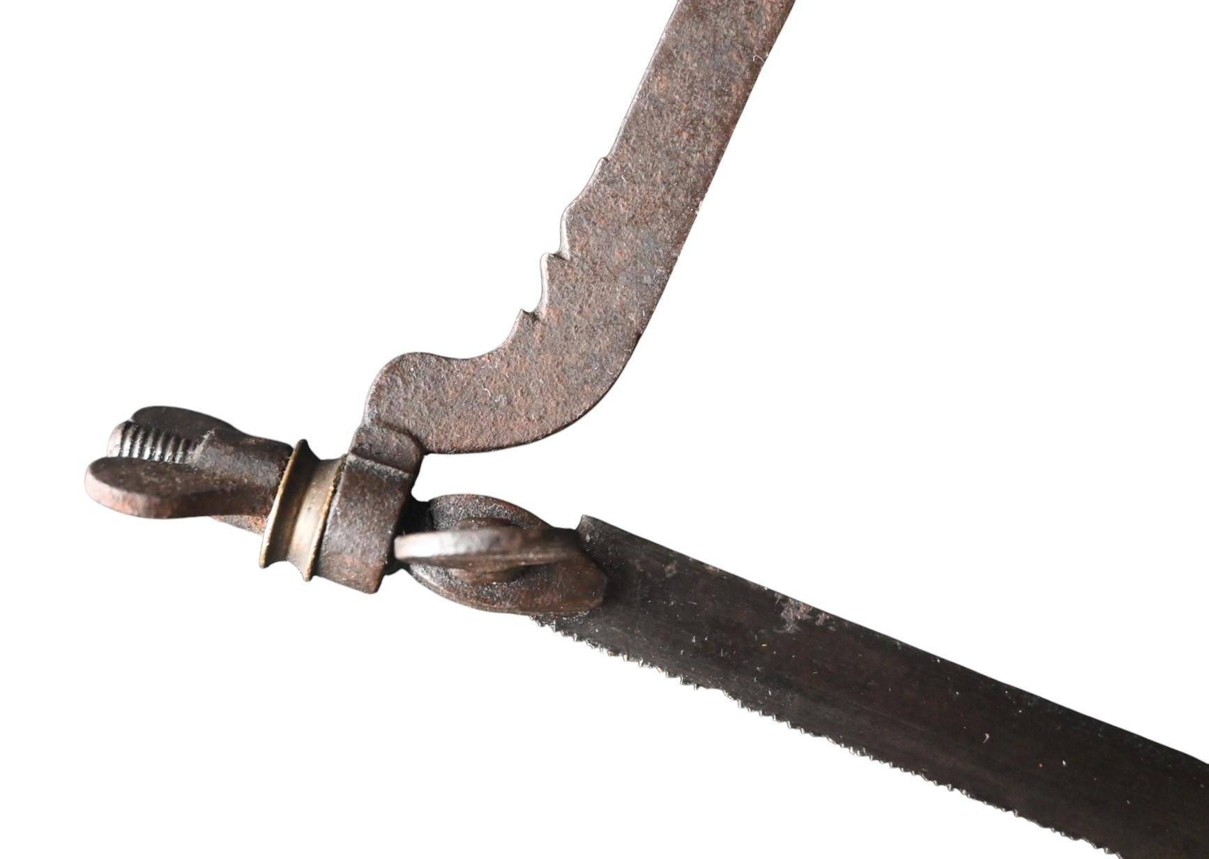 Scultetus amputation saw, late 17th century, early 18th century.
It measures 32cm in length, with an 11cm blade. The blade can be removed by loosening the two screws, which are in good working order.