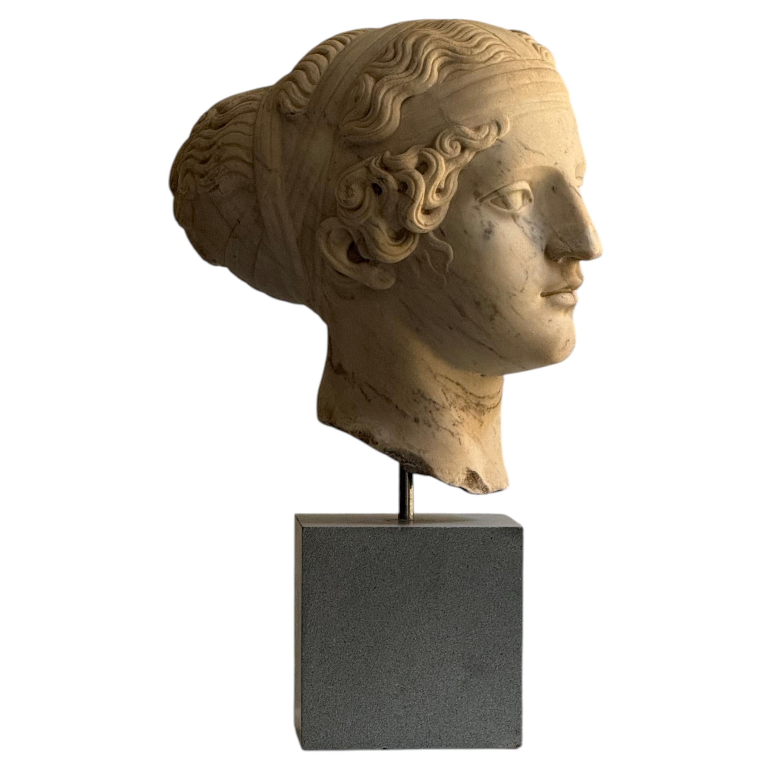 Marble sculpture depicting the head of a young woman - second half of the 19th century
