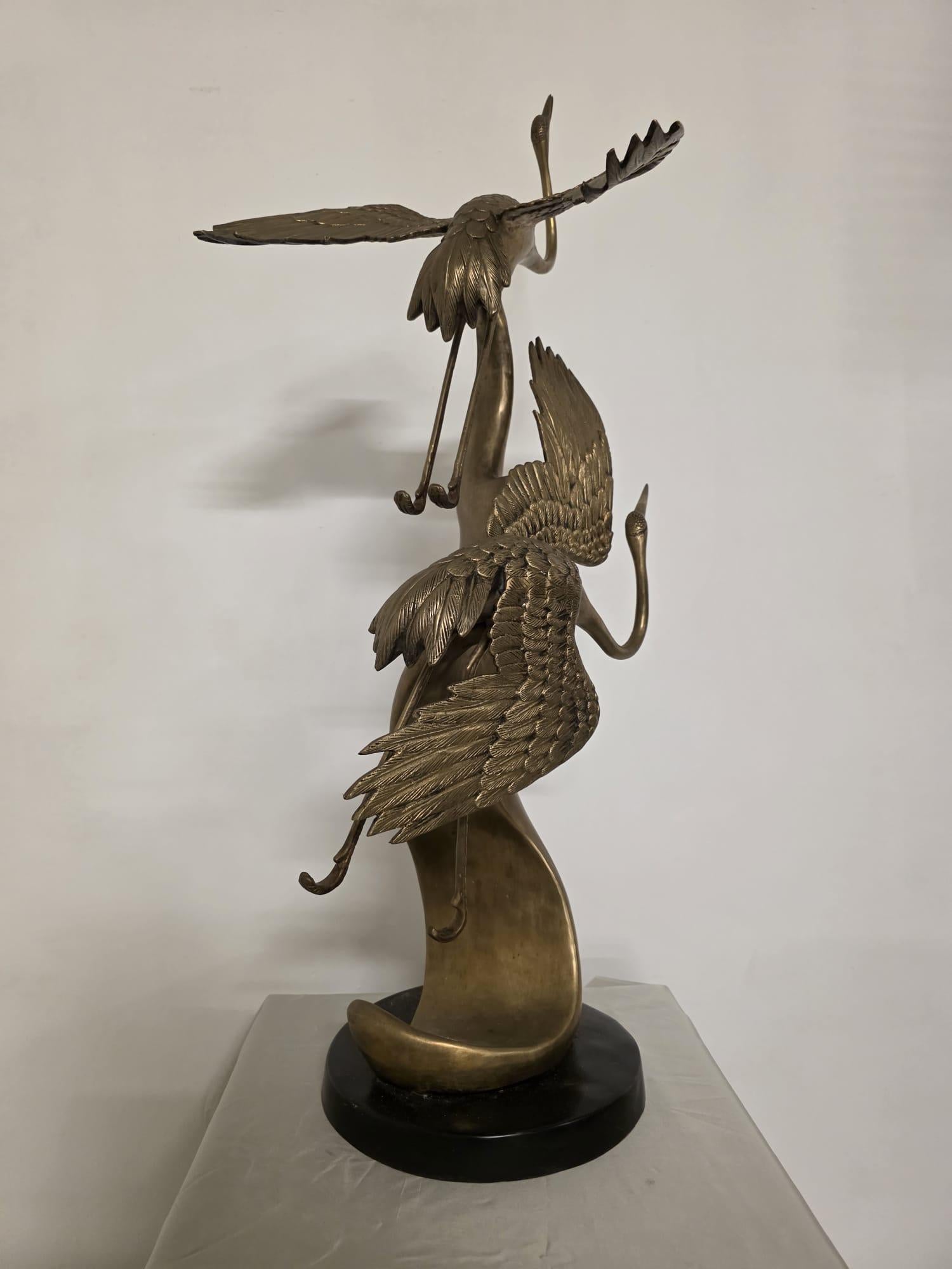 Laiton Scultura in ottone, raffigurante Aironi Cenerini in volo, anni 40' en vente