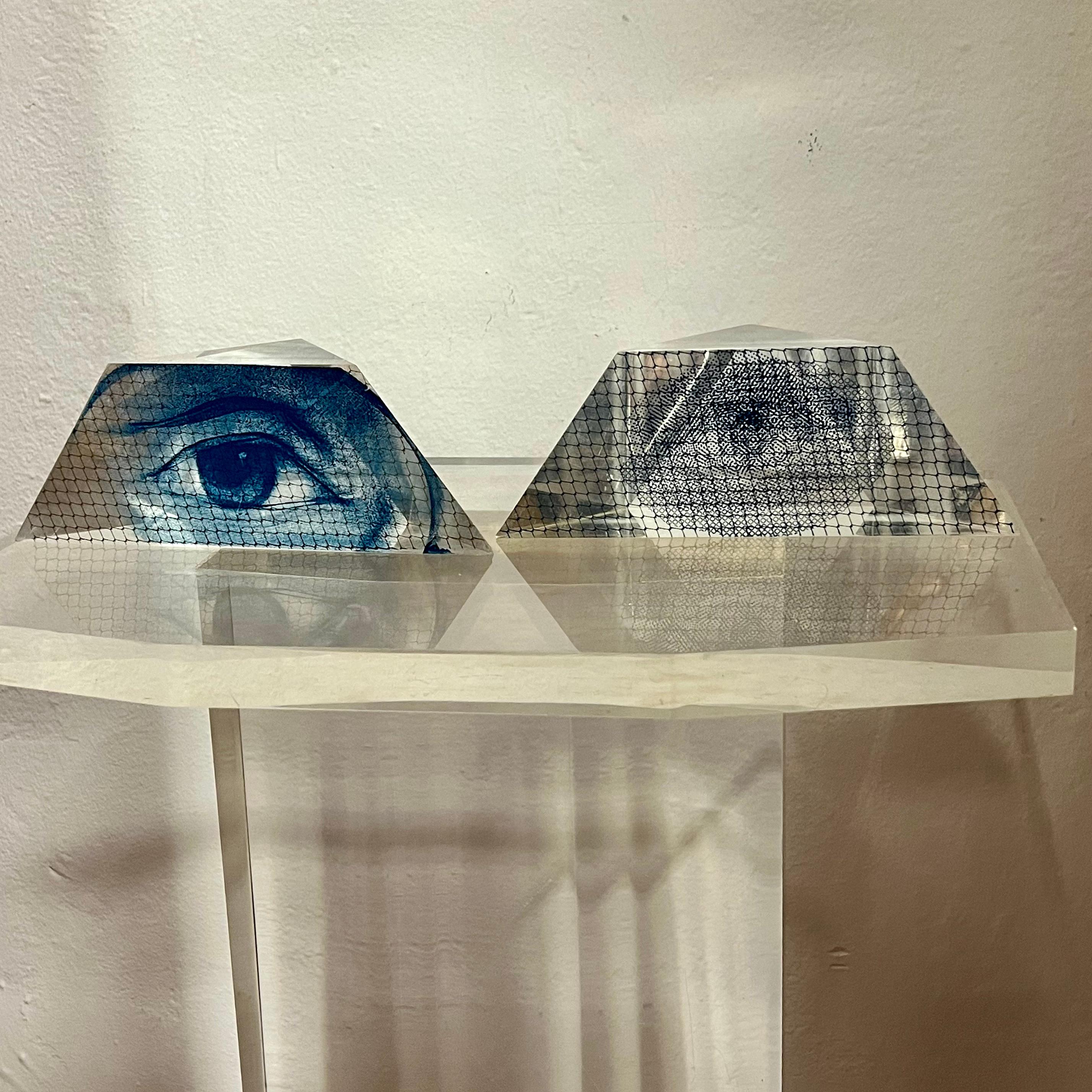 Multiple work made in 100 pieces, consisting of two faceted plexiglass solids, signed dated on one side.

Born in 1954 in Montebelluna, in the province of Treviso. Of Veneto origin, he lives and works in Milan. A graduate of the Venice Academy of