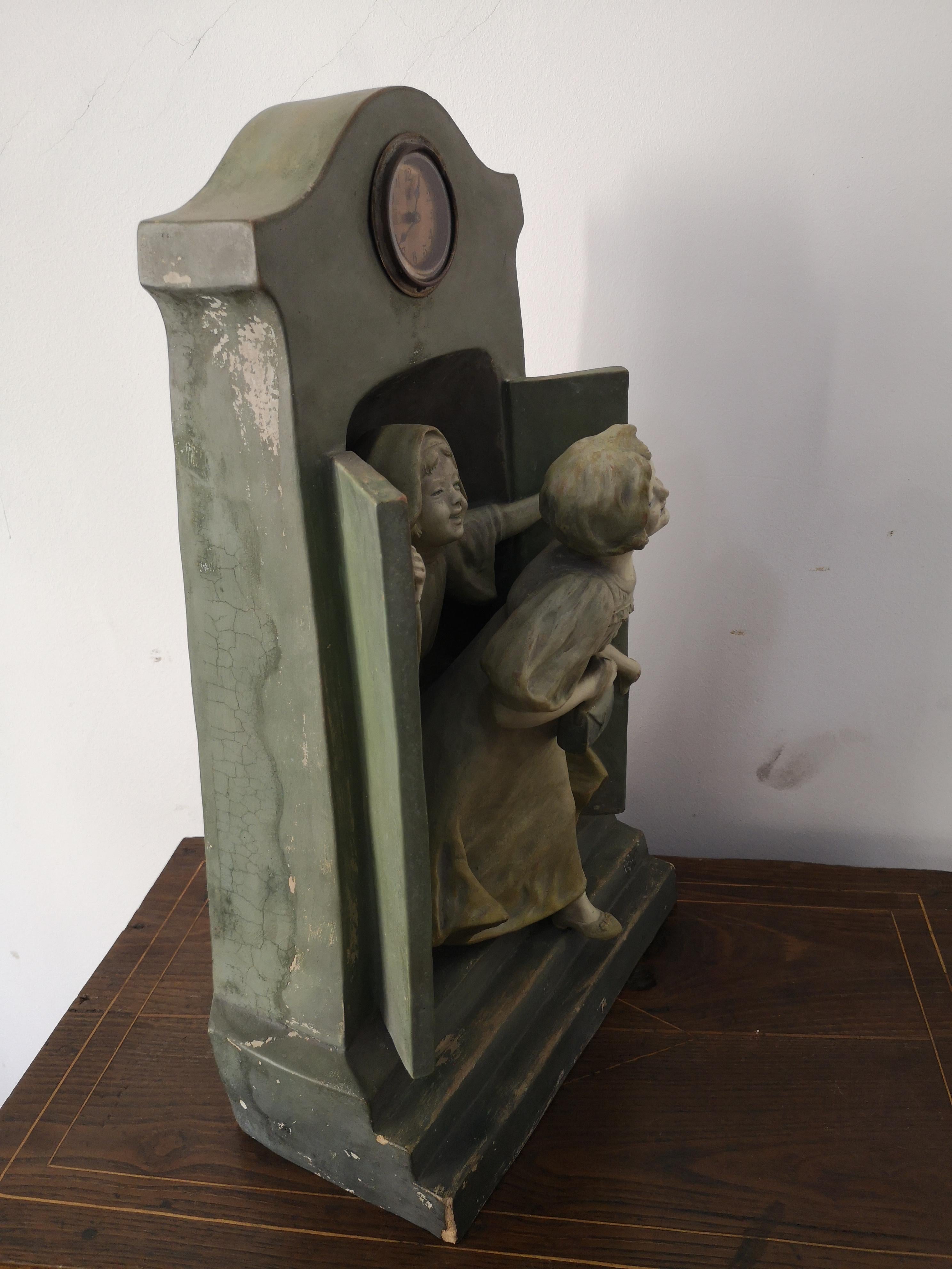 Terracotta sculpture with children and clock, late 19th century For Sale 1