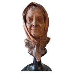 Terracotta sculpture depicting elderly woman signed Giuseppe Renda 